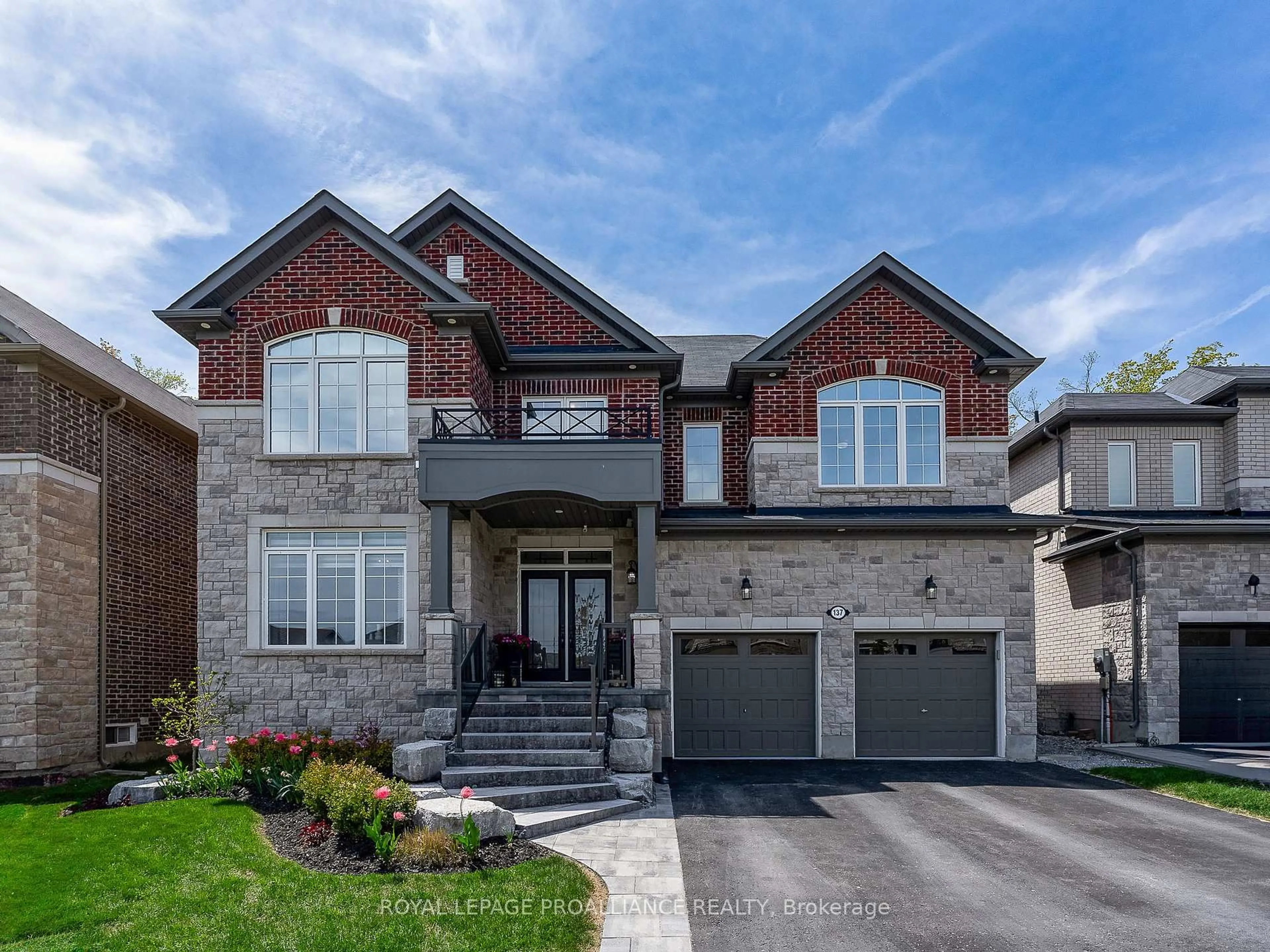Home with brick exterior material, street for 137 Highlands Blvd, Cavan Monaghan Ontario L0A 1G0