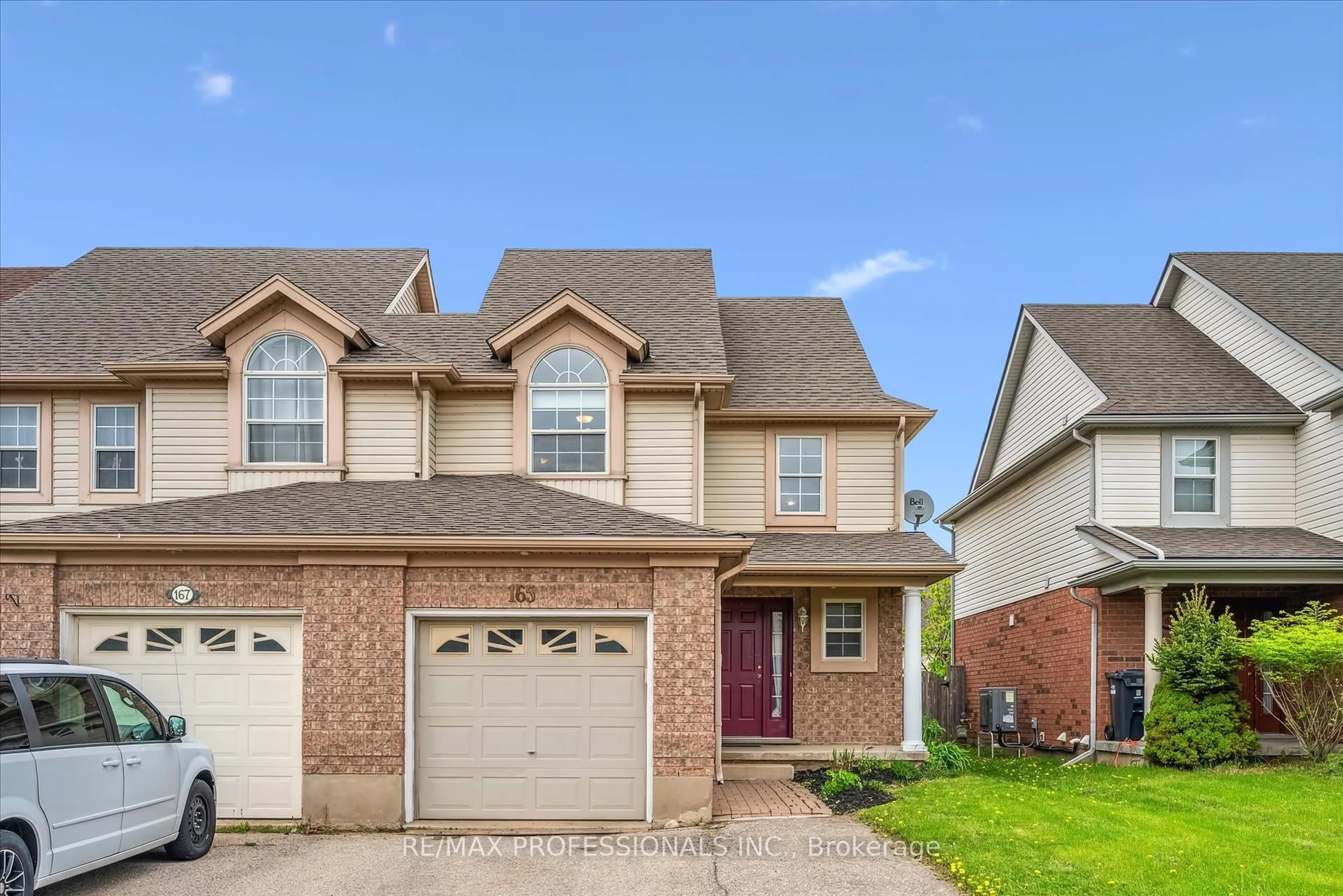 Home with brick exterior material, street for 165 Silurian Dr, Guelph Ontario N1E 7E6