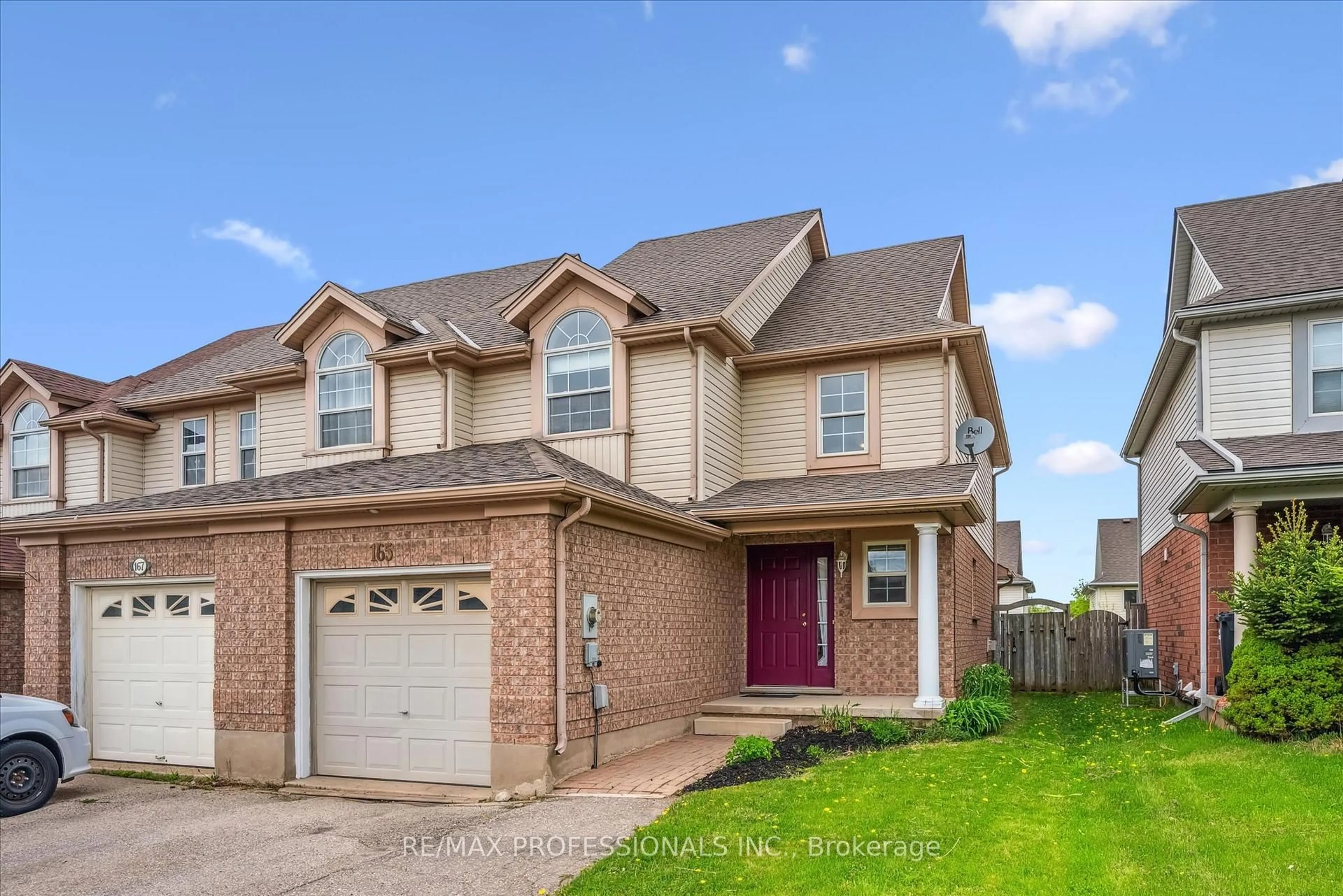 Home with brick exterior material, street for 165 Silurian Dr, Guelph Ontario N1E 7E6