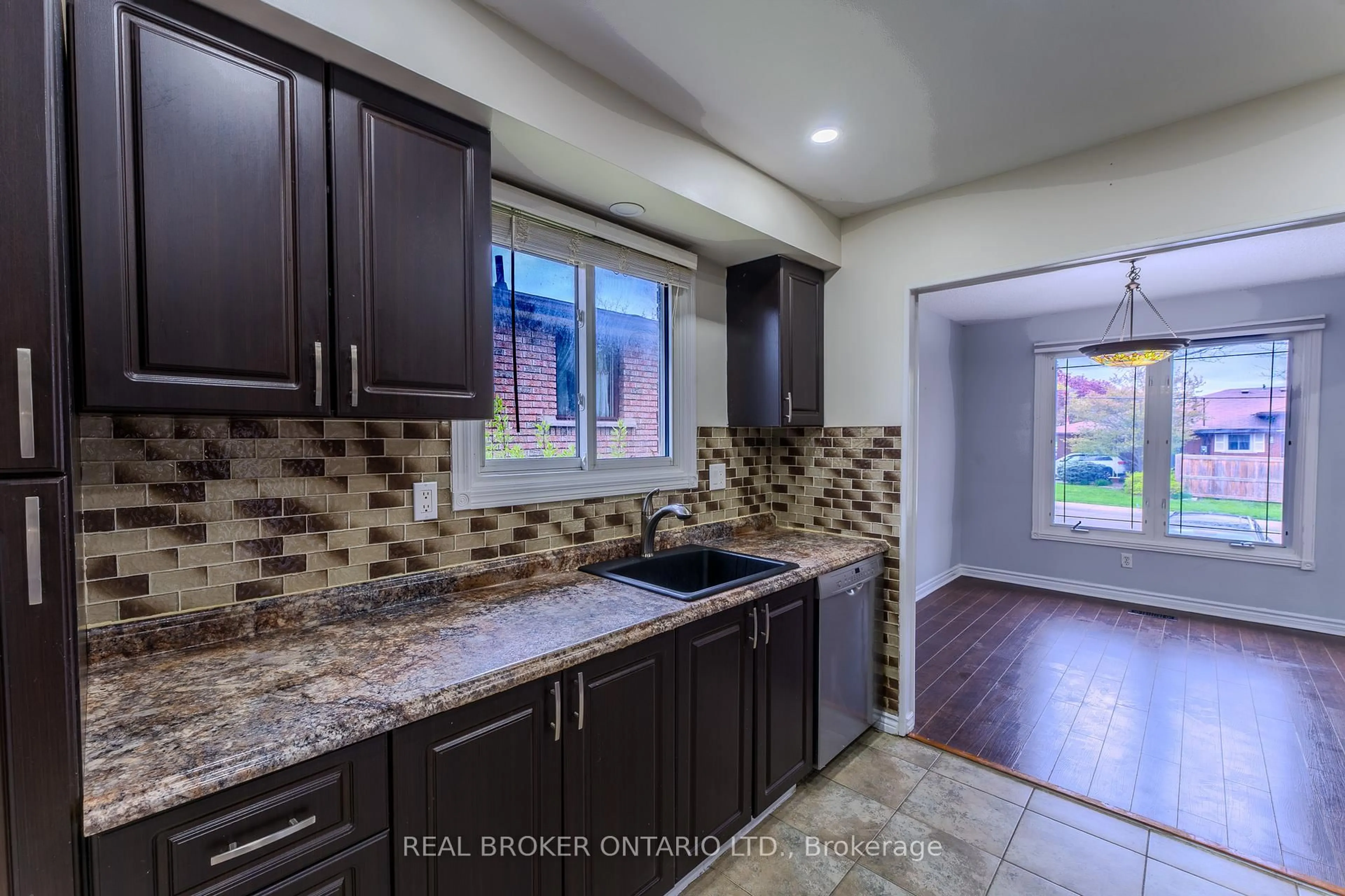 Open concept kitchen, ceramic/tile floor for 17 Taymall St, Hamilton Ontario L8W 1Z7