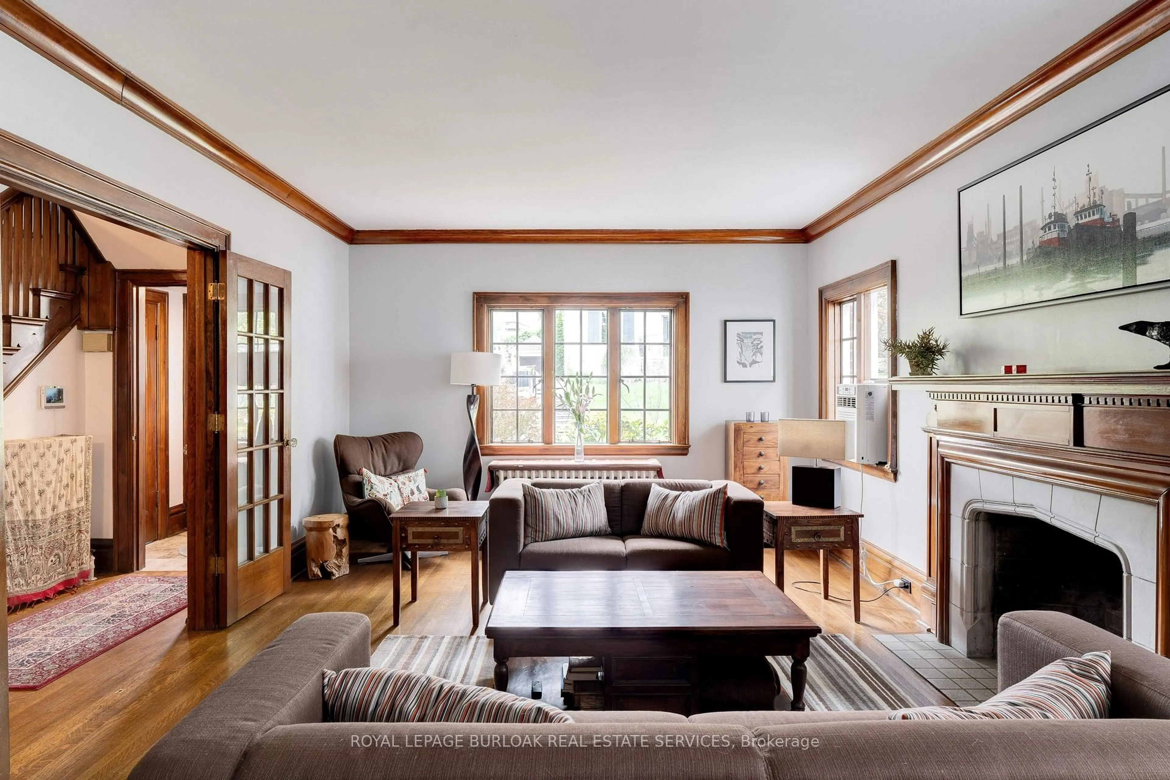 Living room with furniture, wood/laminate floor for 8 Turner Ave, Hamilton Ontario L8P 3K5