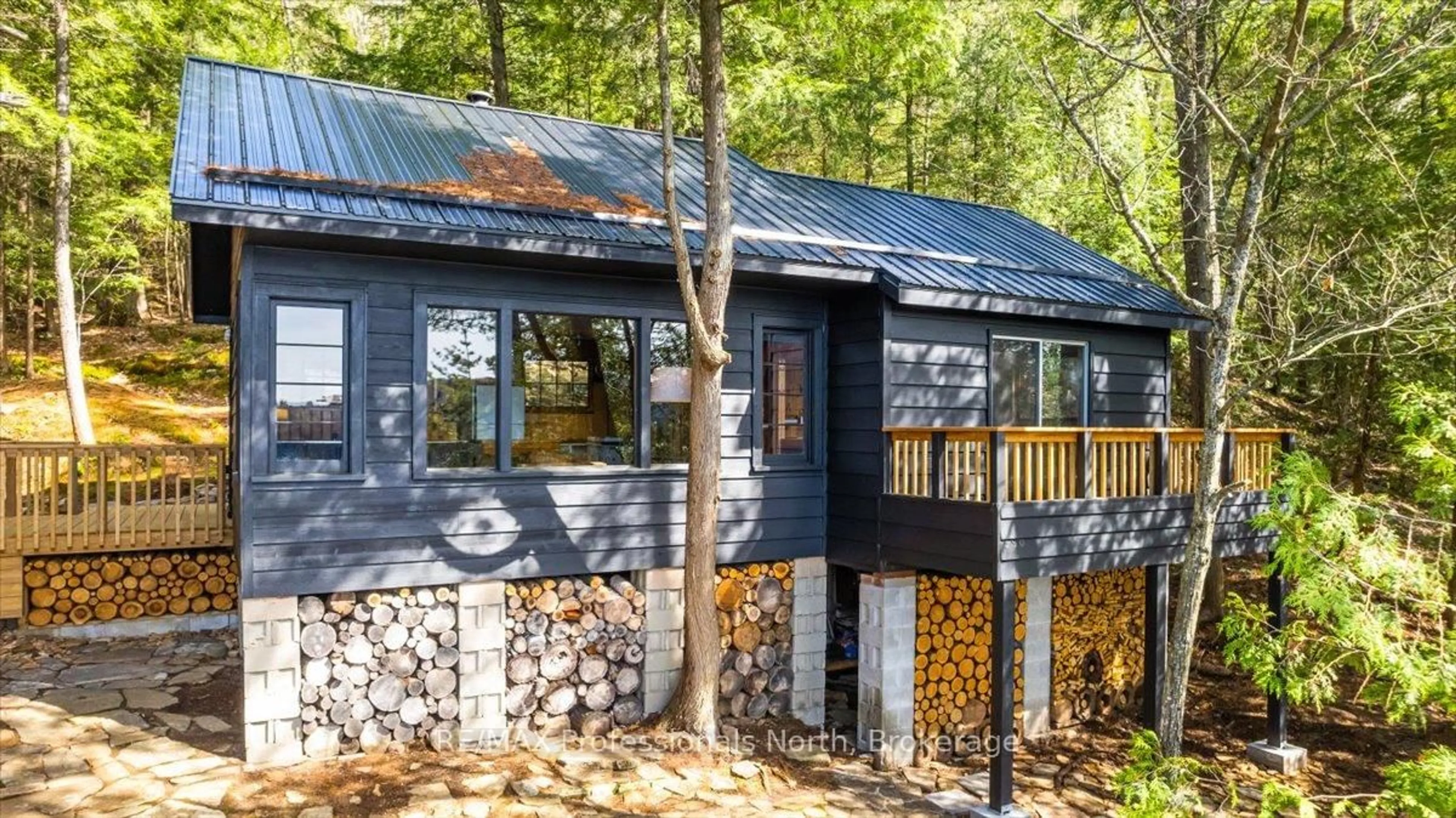 Home with vinyl exterior material, forest/trees view for 12865 Little Hawk South Sh N/A, Algonquin Highlands Ontario K0M 1J1