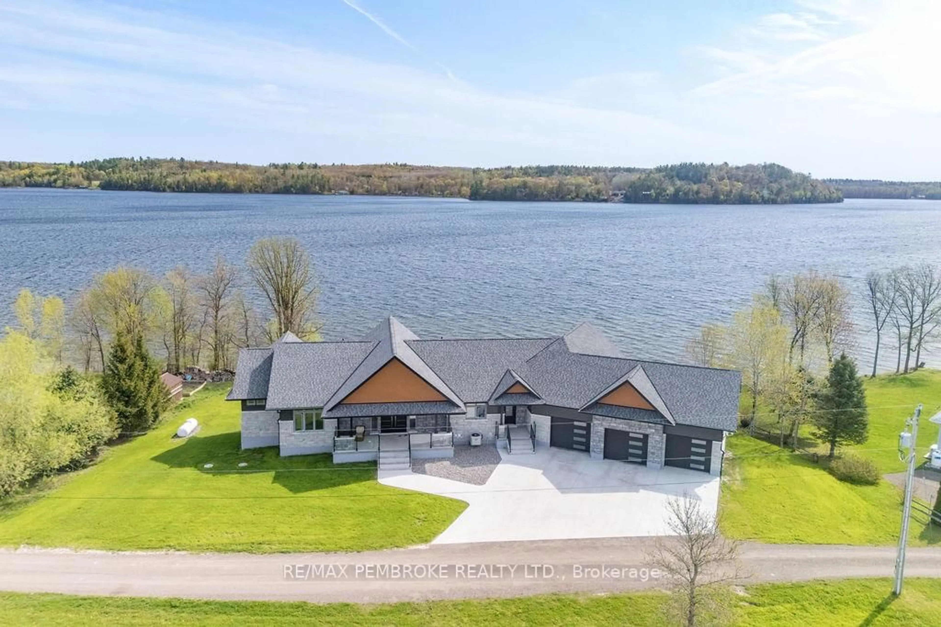 A pic from outside/outdoor area/front of a property/back of a property/a pic from drone, water/lake/river/ocean view for 231 Finnerty Rd, Cobden Ontario K0J 1K0