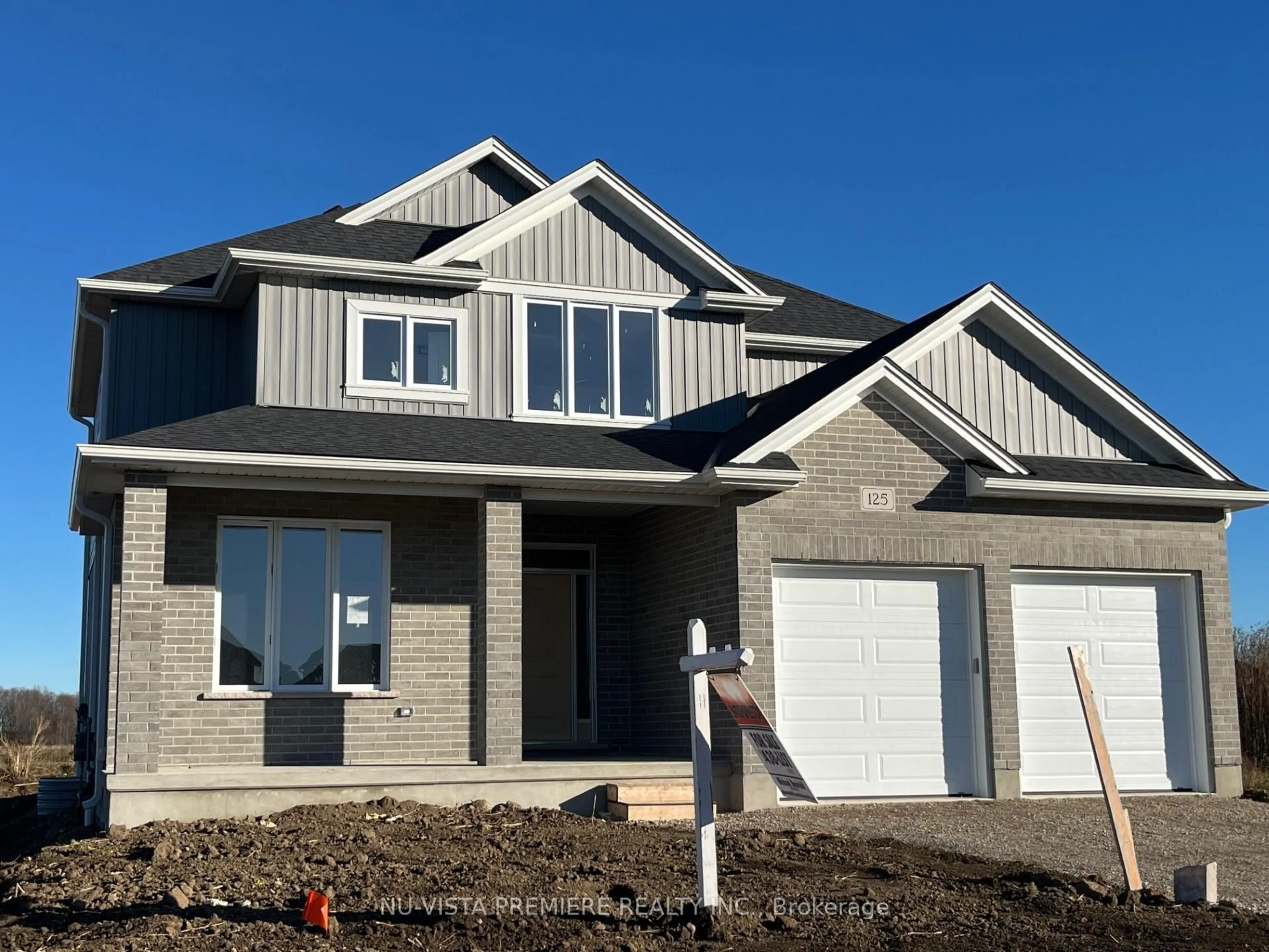 Home with brick exterior material, street for 125 Watts Dr, Lucan Biddulph Ontario N0M 2J0