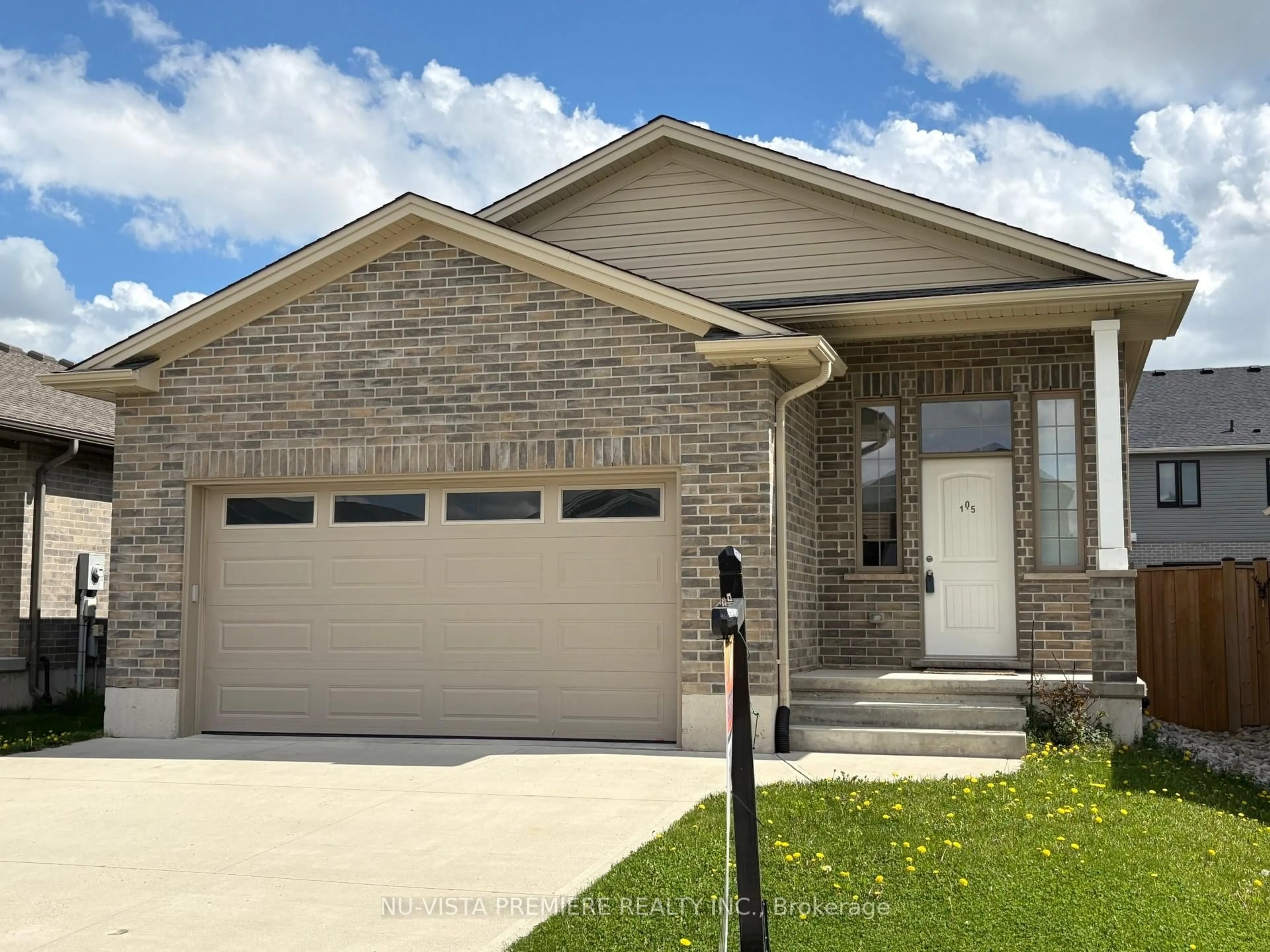Home with brick exterior material, street for 105 Gilmour Dr, Lucan Biddulph Ontario N0M 2J0