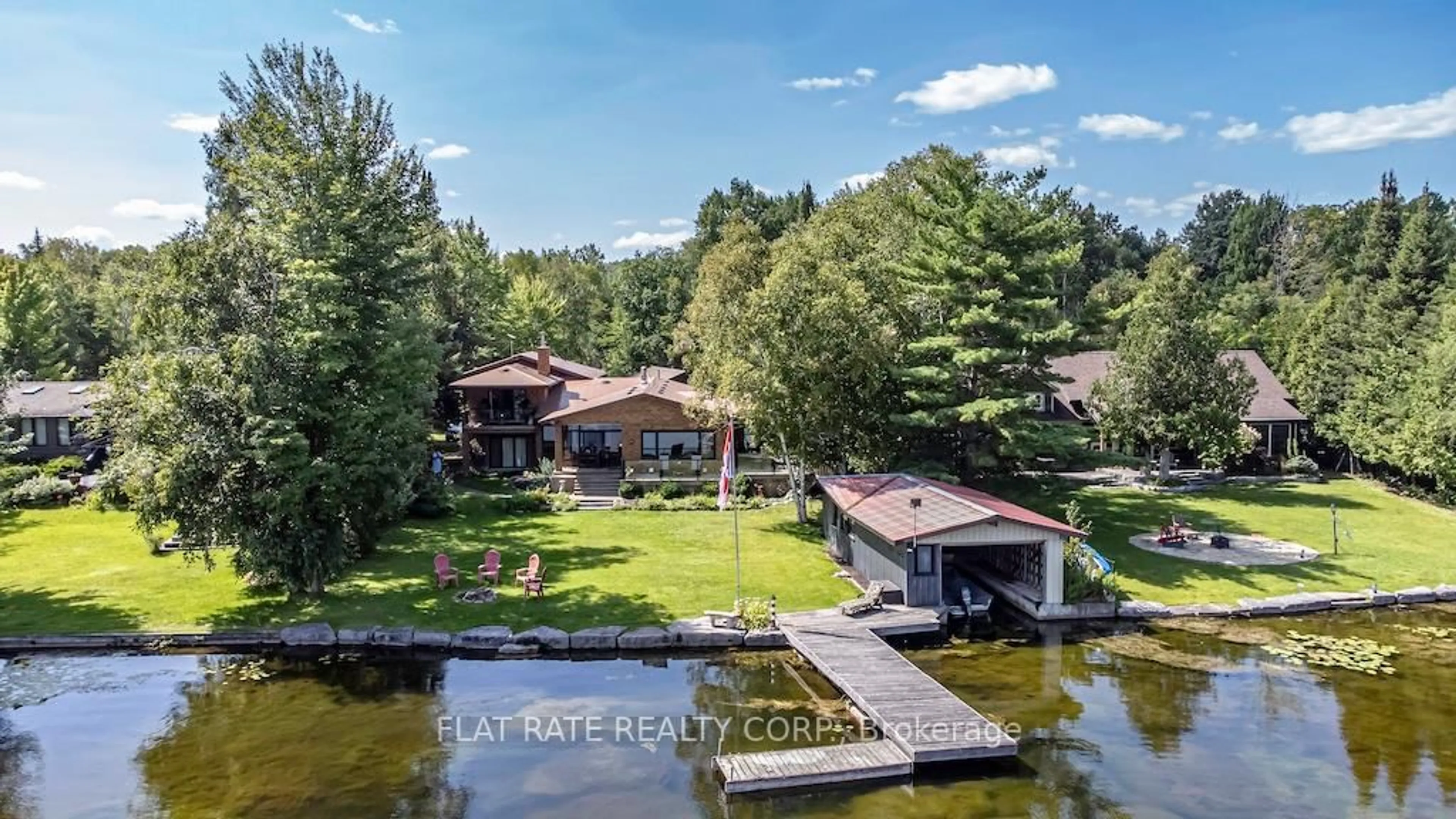 A pic from outside/outdoor area/front of a property/back of a property/a pic from drone, water/lake/river/ocean view for 135 Melody Bay Rd, Trent Lakes Ontario K0L 2H0