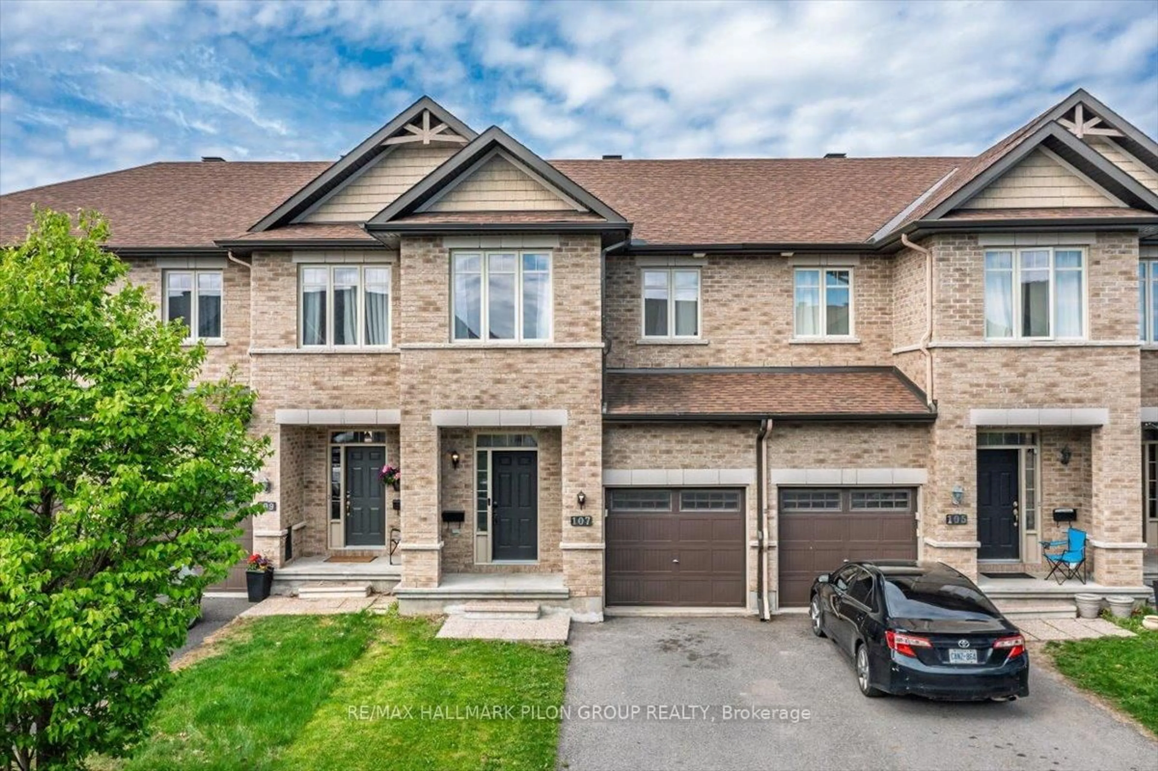 Home with brick exterior material, street for 107 Watchhorn Grve, Ottawa Ontario K1V 2N3