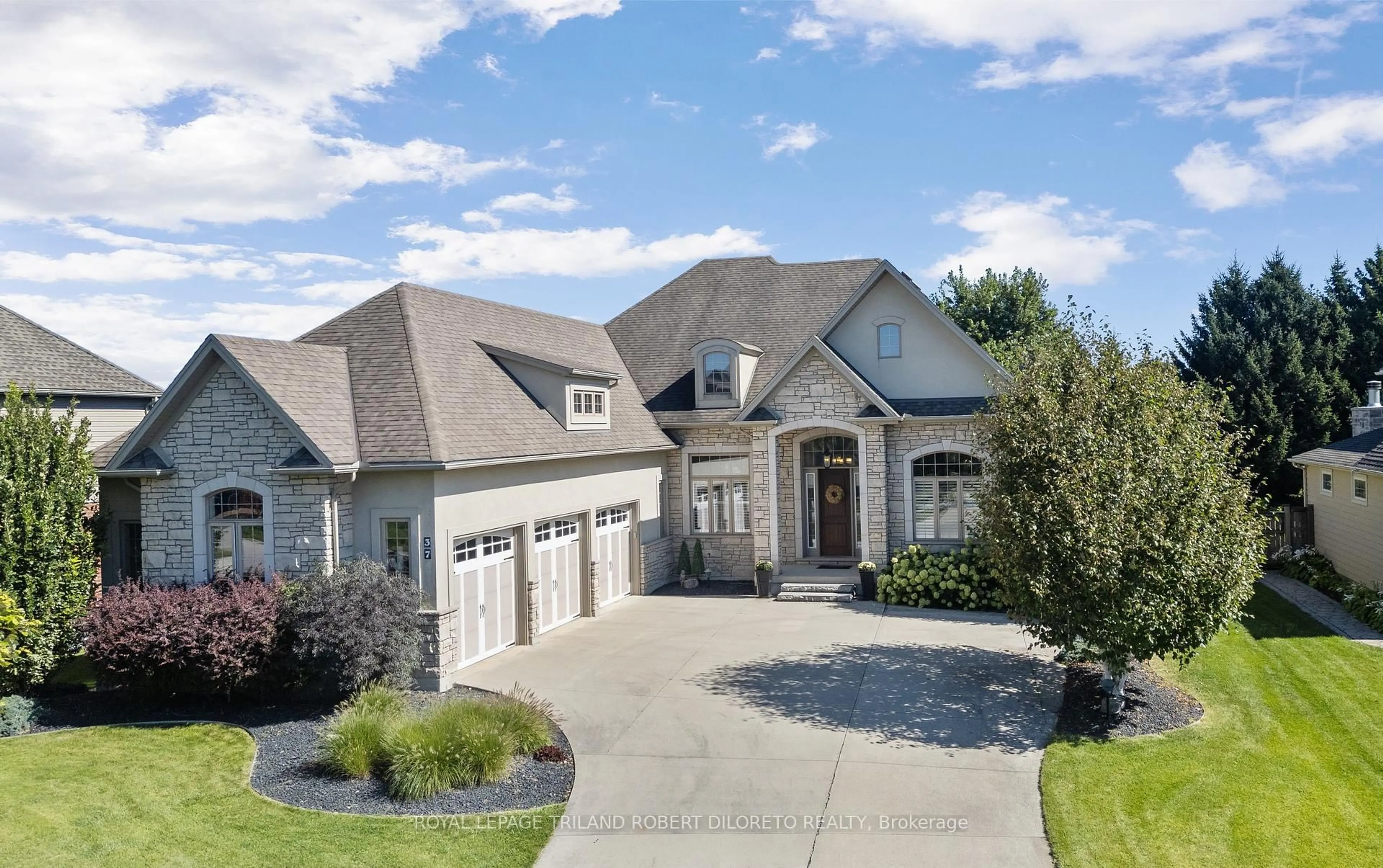 Home with brick exterior material, street for 37 Baron Cres, Middlesex Centre Ontario N0L 1R0