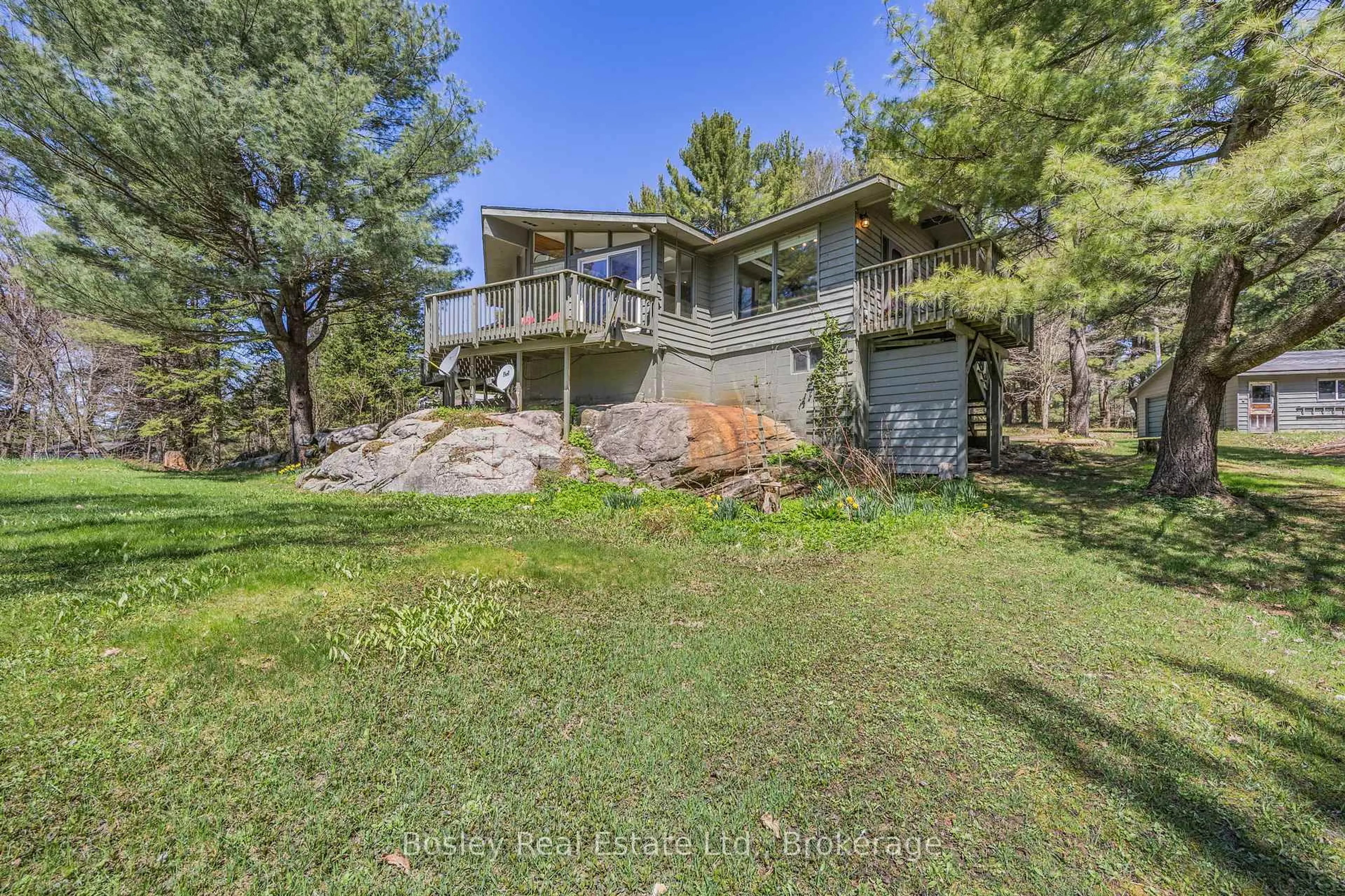 A pic from outside/outdoor area/front of a property/back of a property/a pic from drone, water/lake/river/ocean view for 22 Shebeshekong Estates Rd, Carling Ontario P0G 1G0
