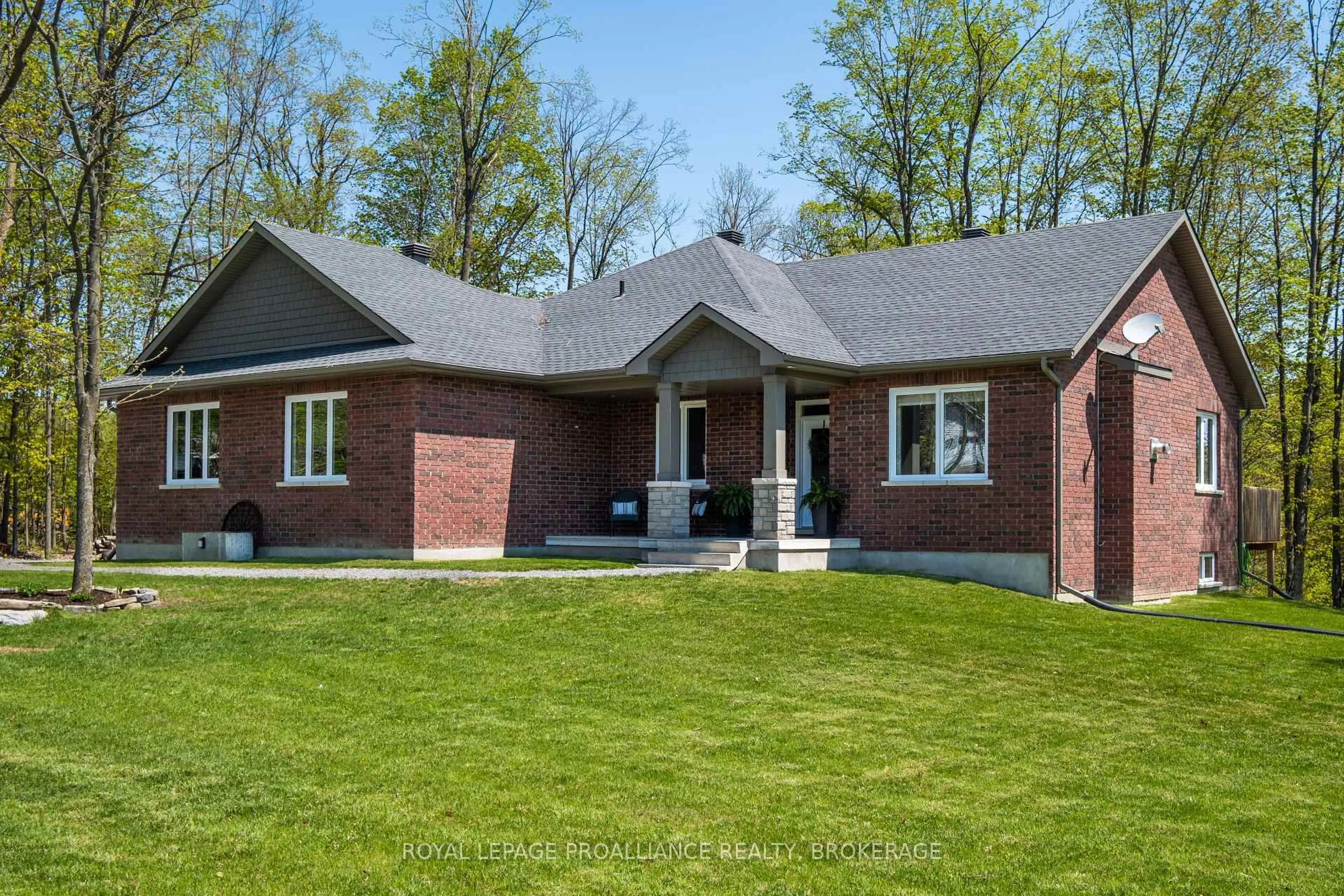 Home with brick exterior material, street for 4470 Larry York Rd, Battersea Ontario K0H 1H0