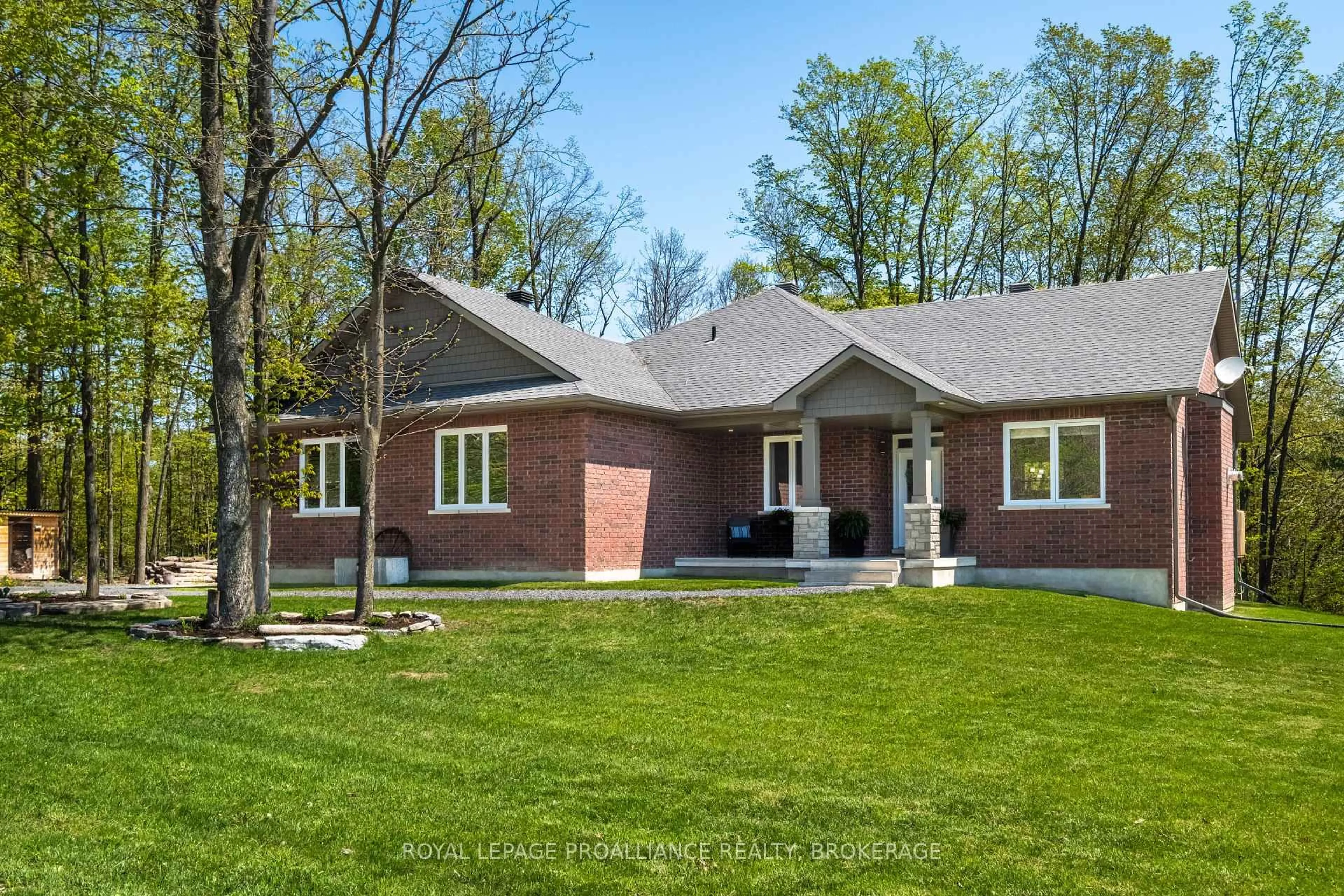 Home with brick exterior material, street for 4470 Larry York Rd, Battersea Ontario K0H 1H0