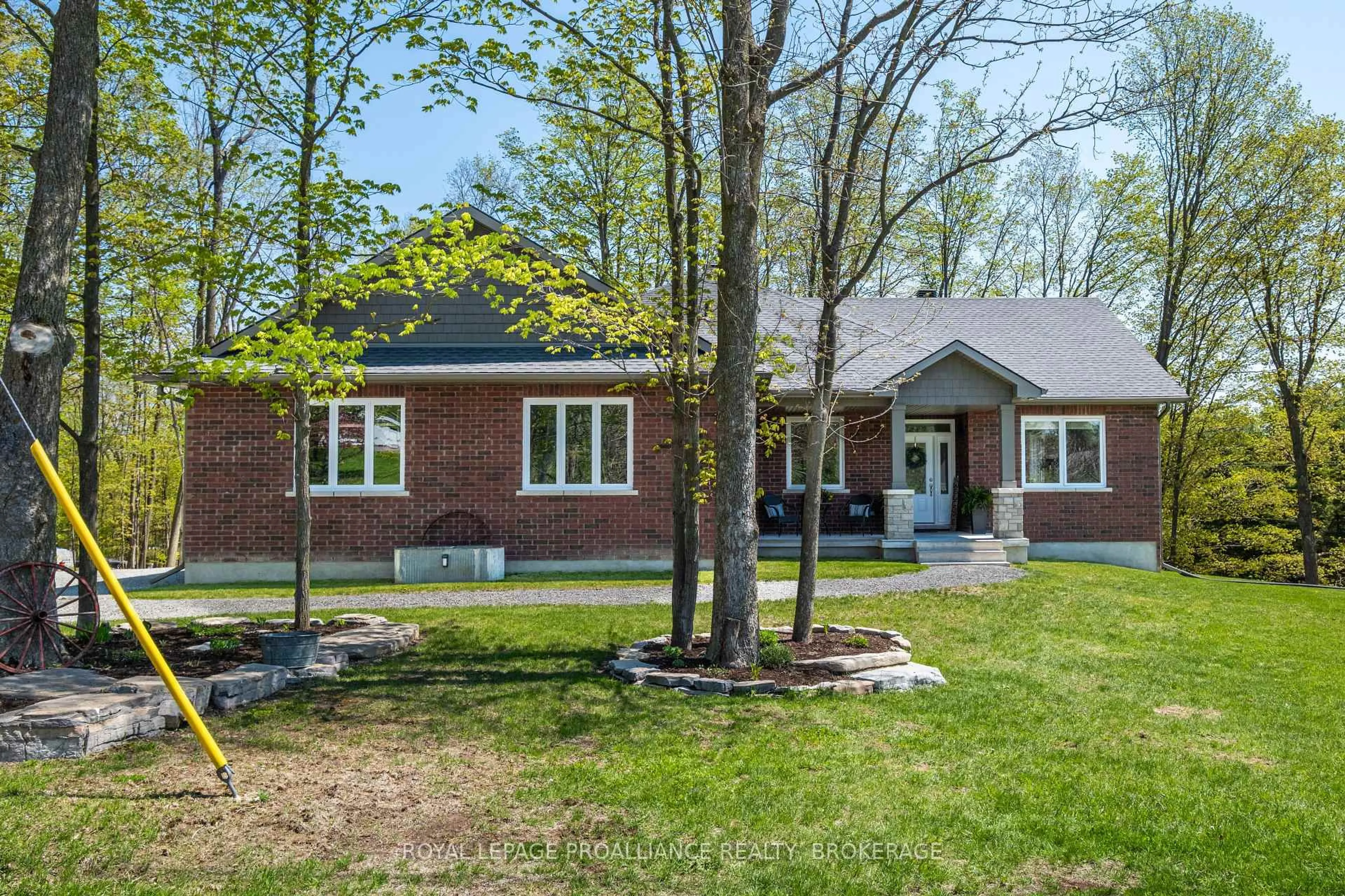 Home with brick exterior material, street for 4470 Larry York Rd, Battersea Ontario K0H 1H0
