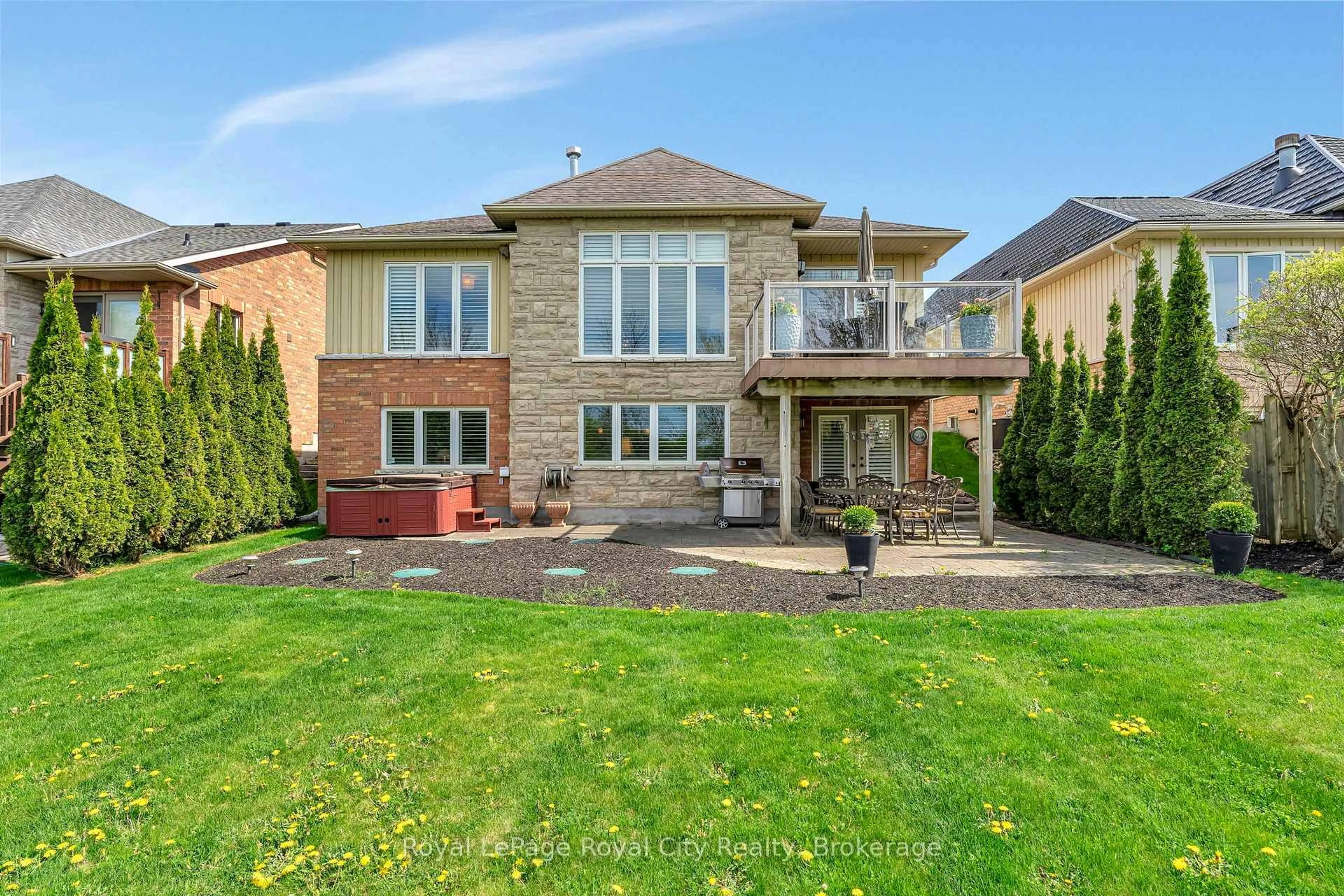 Home with brick exterior material, street for 74 Aberfoyle Mill Cres, Puslinch Ontario N0B 2J0