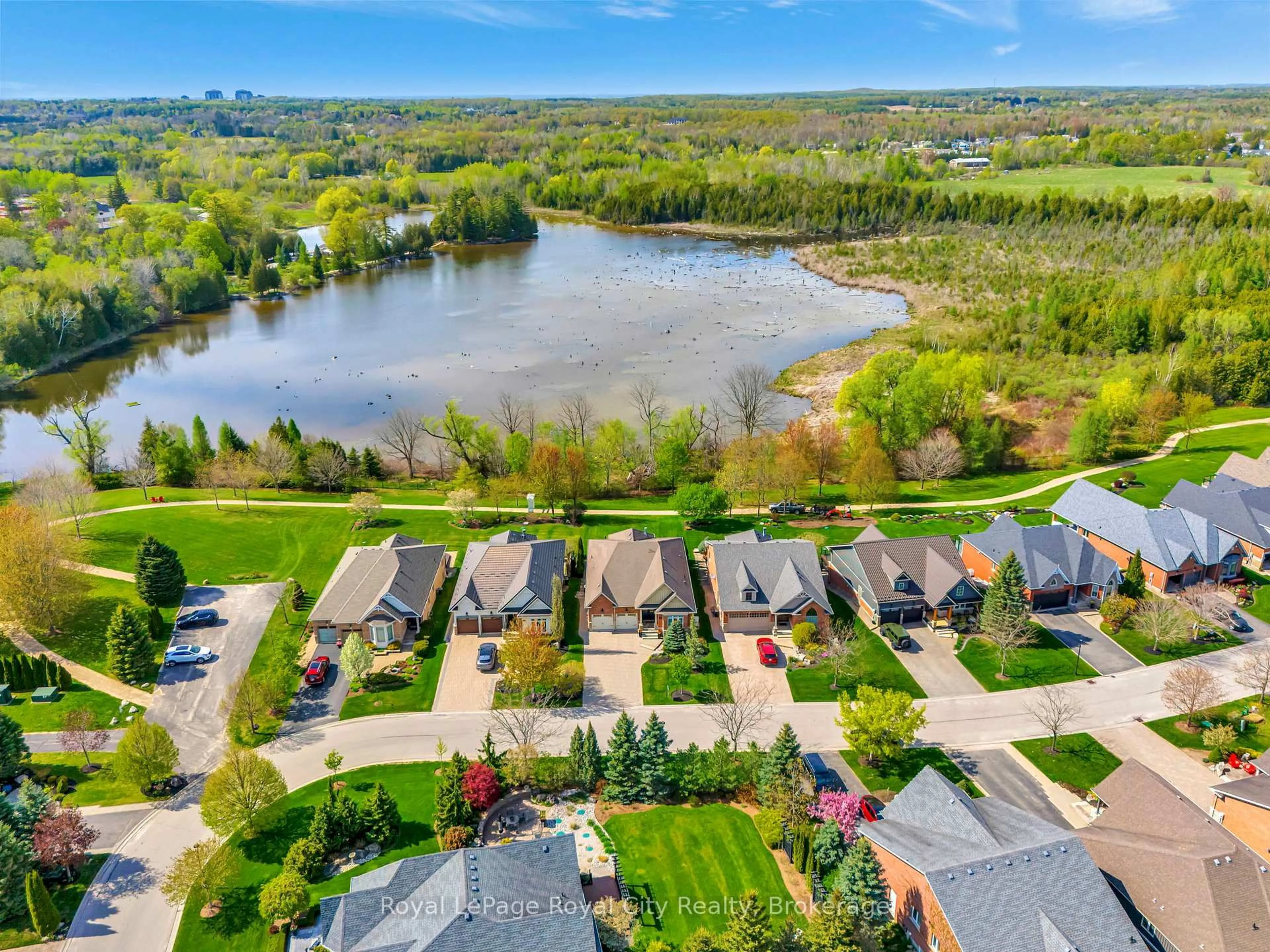A pic from outside/outdoor area/front of a property/back of a property/a pic from drone, water/lake/river/ocean view for 74 Aberfoyle Mill Cres, Puslinch Ontario N0B 2J0