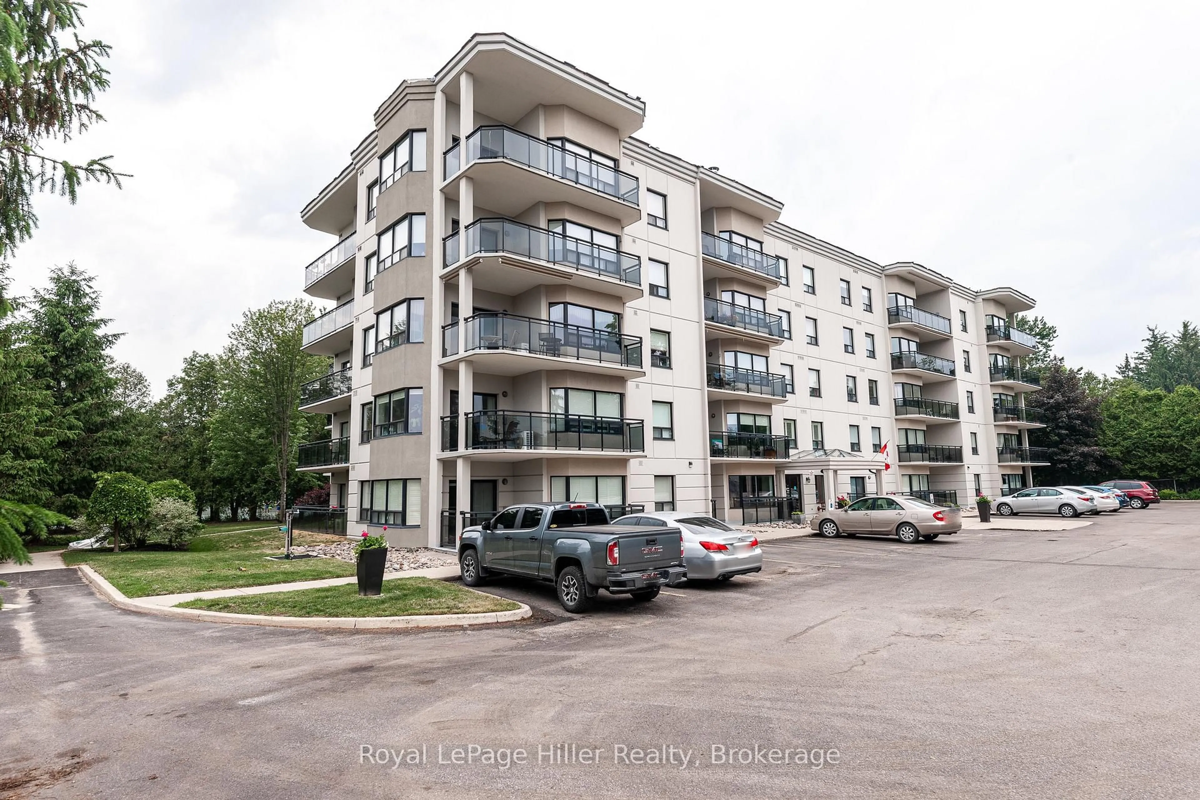 A pic from outside/outdoor area/front of a property/back of a property/a pic from drone, unknown for 160 Romeo St #209, Stratford Ontario N5A 4S9
