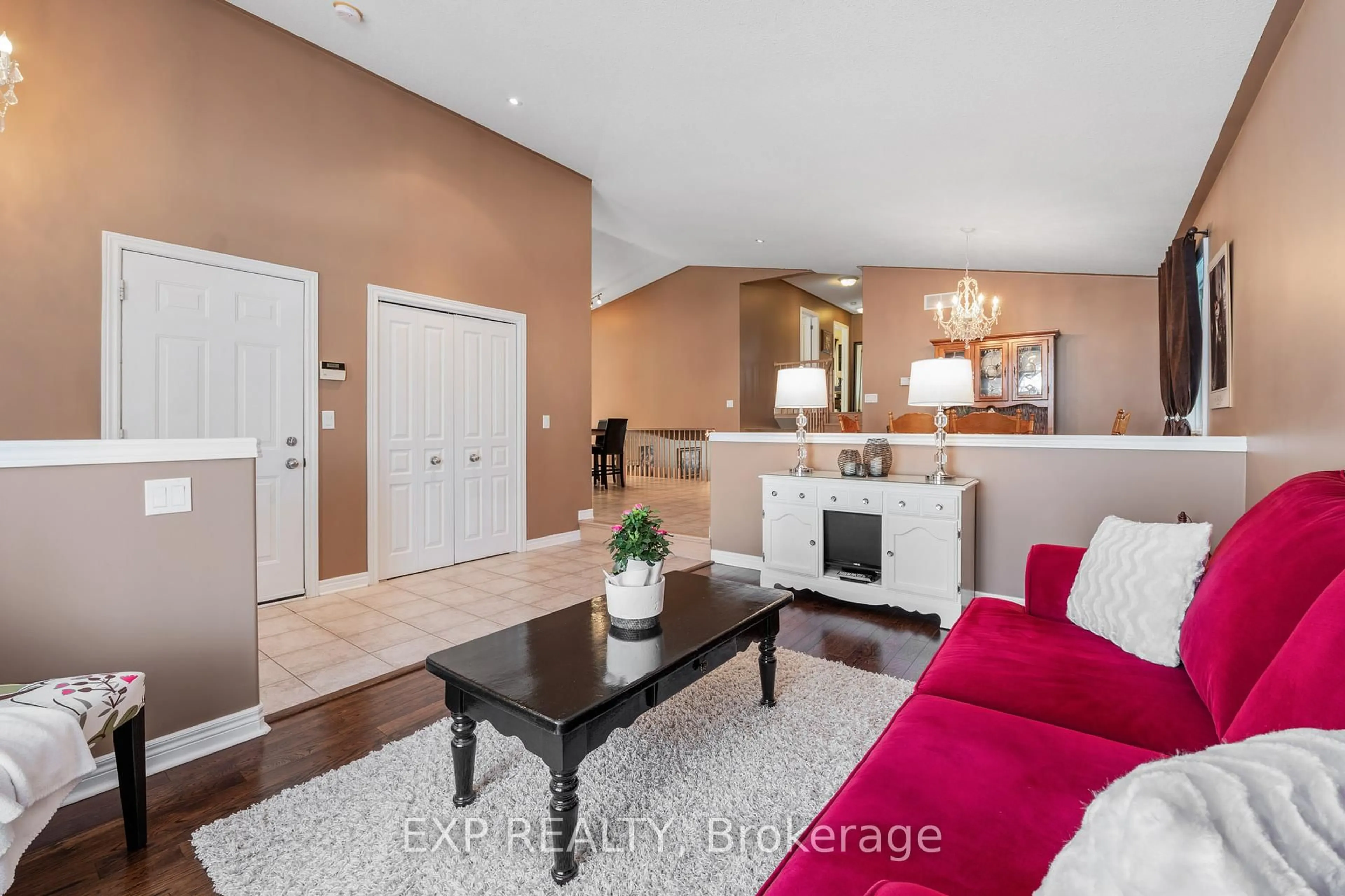 Living room with furniture, ceramic/tile floor for 7090 Julie Dr, Niagara Falls Ontario L2H 3L4