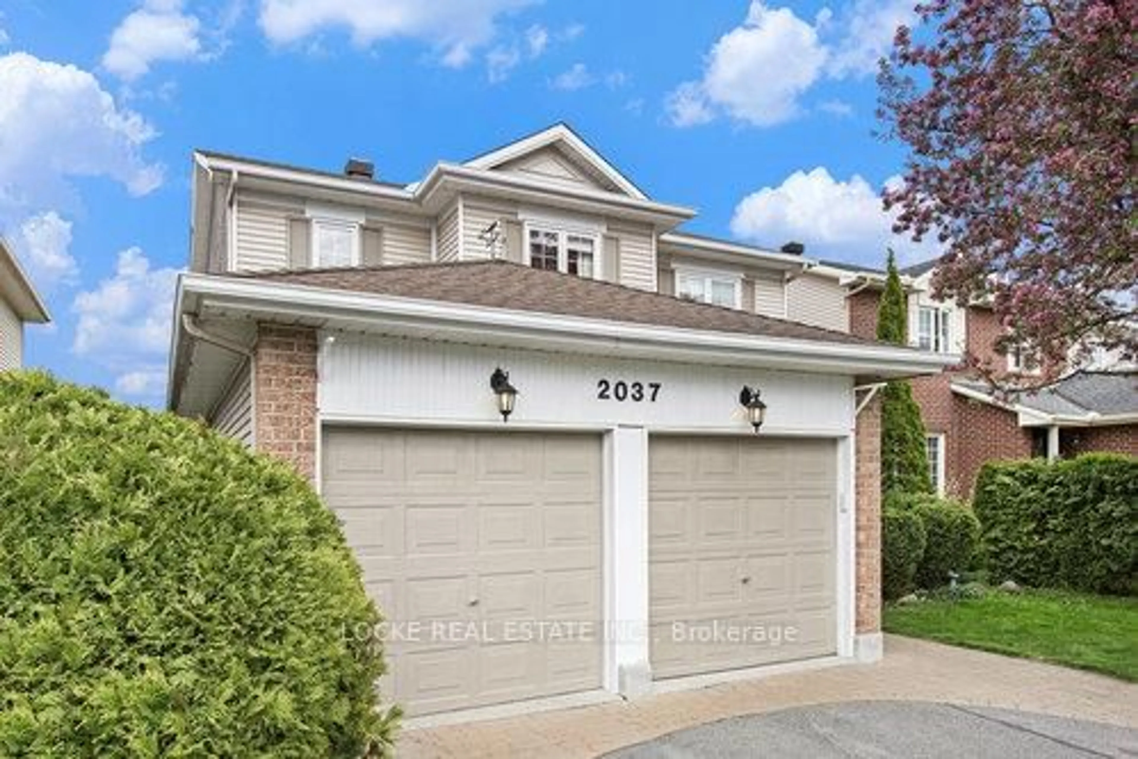 Home with brick exterior material, street for 2037 Rolling Brook Dr, Ottawa Ontario K1W 1C9