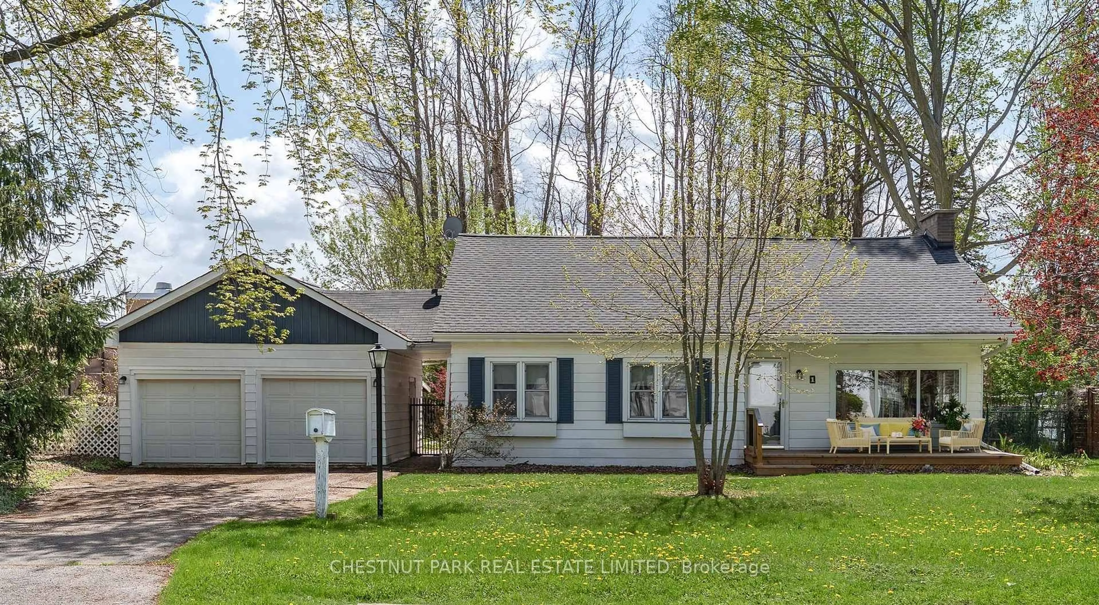 Home with vinyl exterior material, street for 1 Downes Ave, Prince Edward County Ontario K0K 2T0