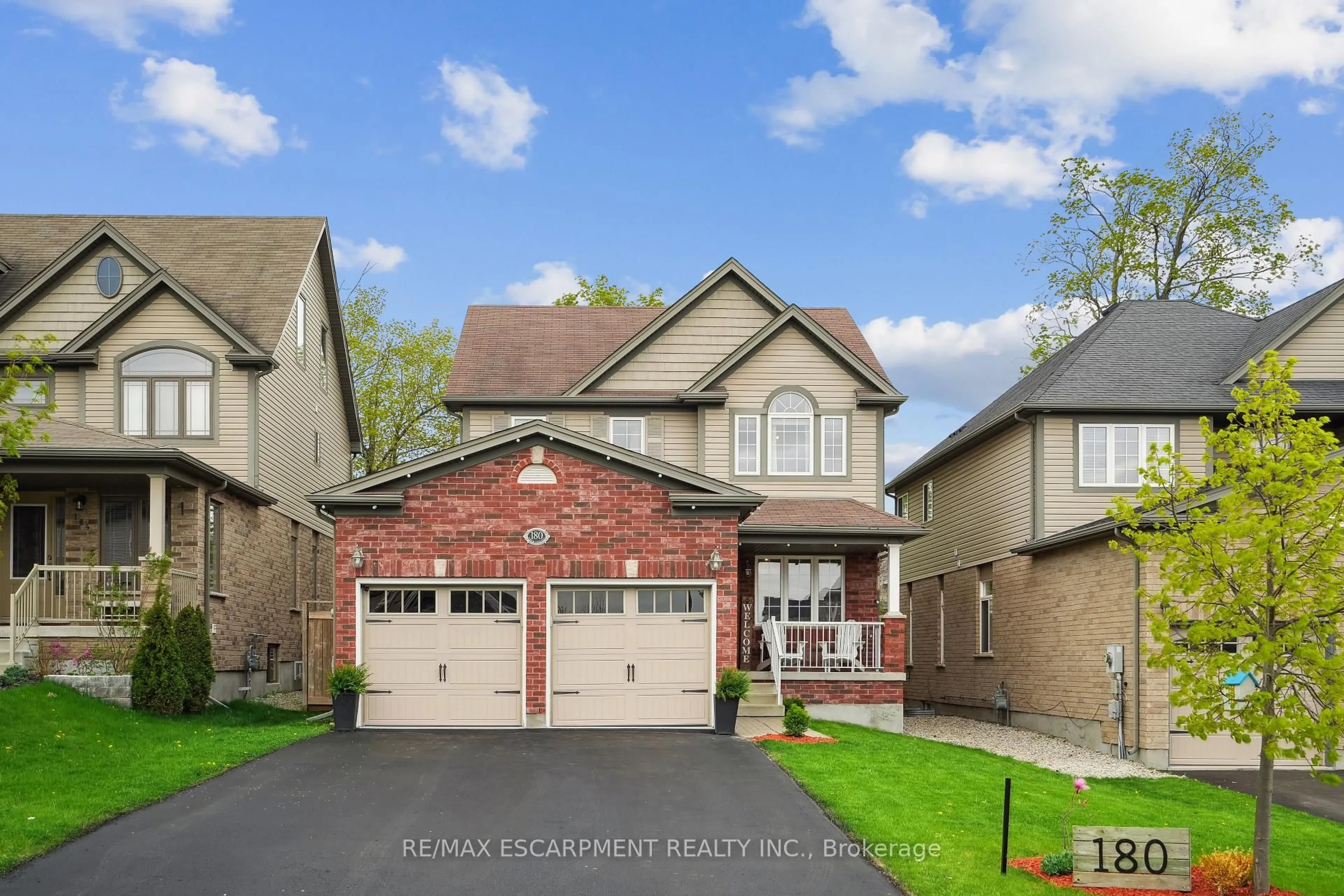 Home with brick exterior material, street for 180 Coker Cres, Guelph/Eramosa Ontario N0B 2K0