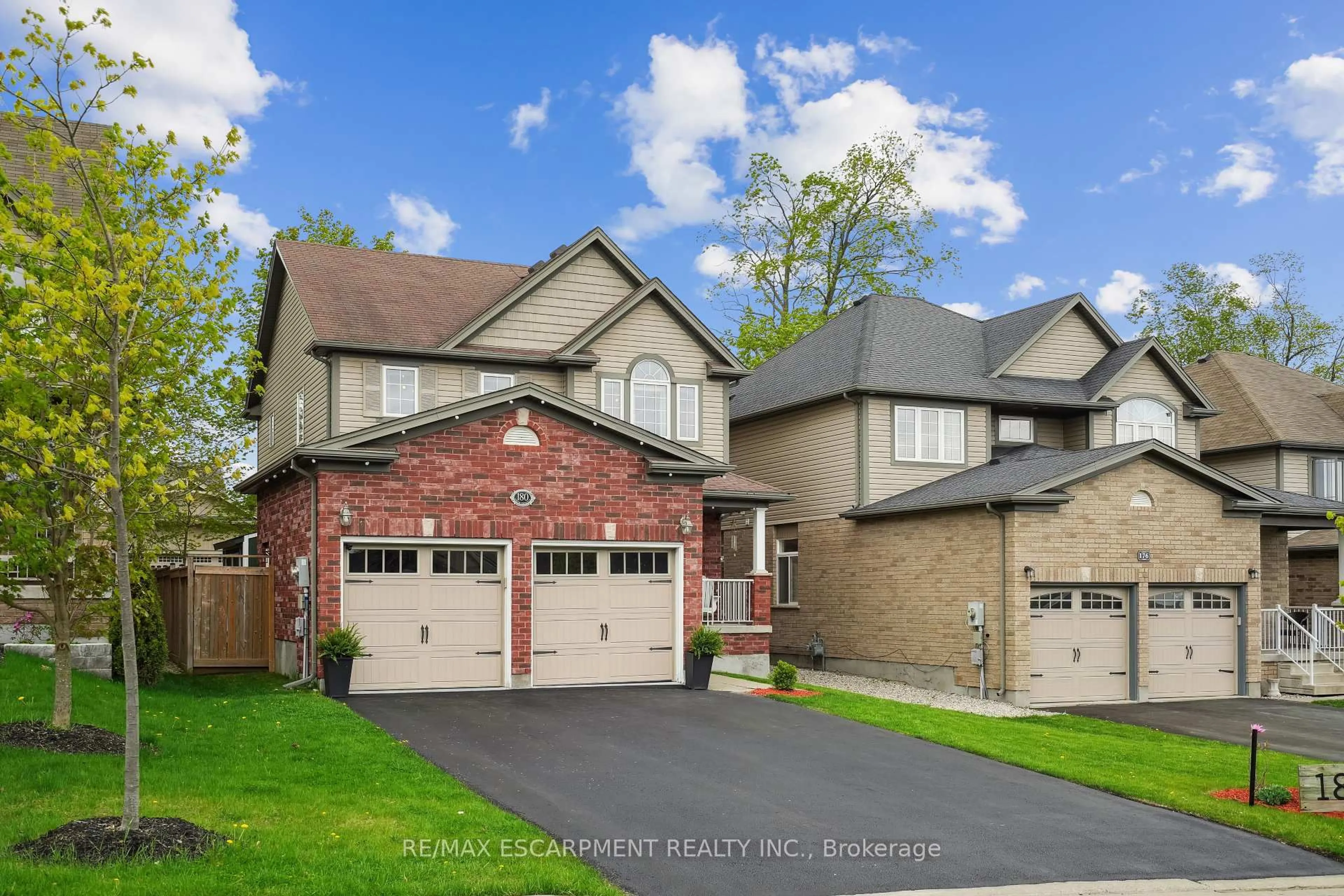 Home with brick exterior material, street for 180 Coker Cres, Guelph/Eramosa Ontario N0B 2K0