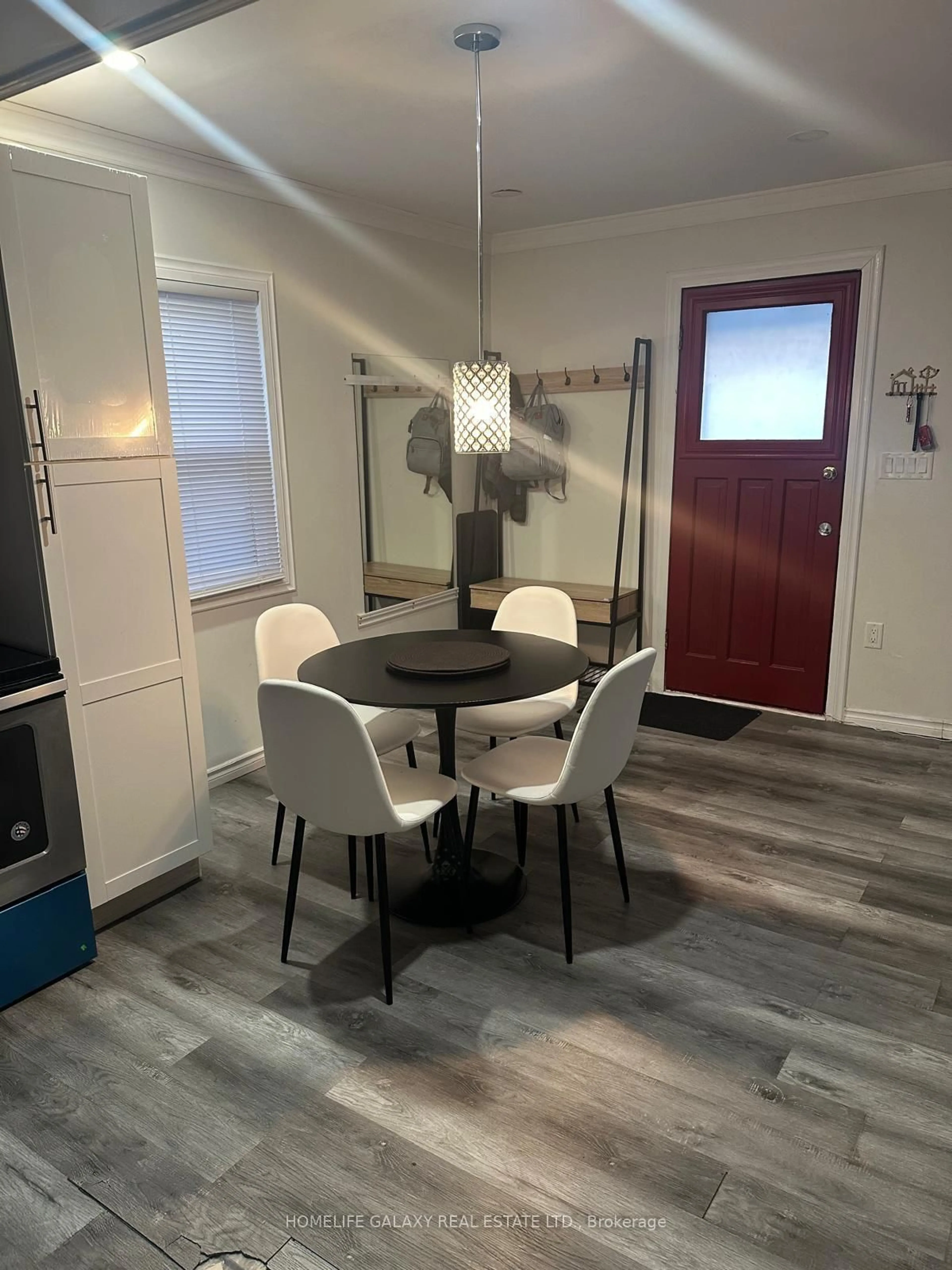 Dining room, wood/laminate floor for 5232 Stamford St, Niagara Falls Ontario L2E 1M9