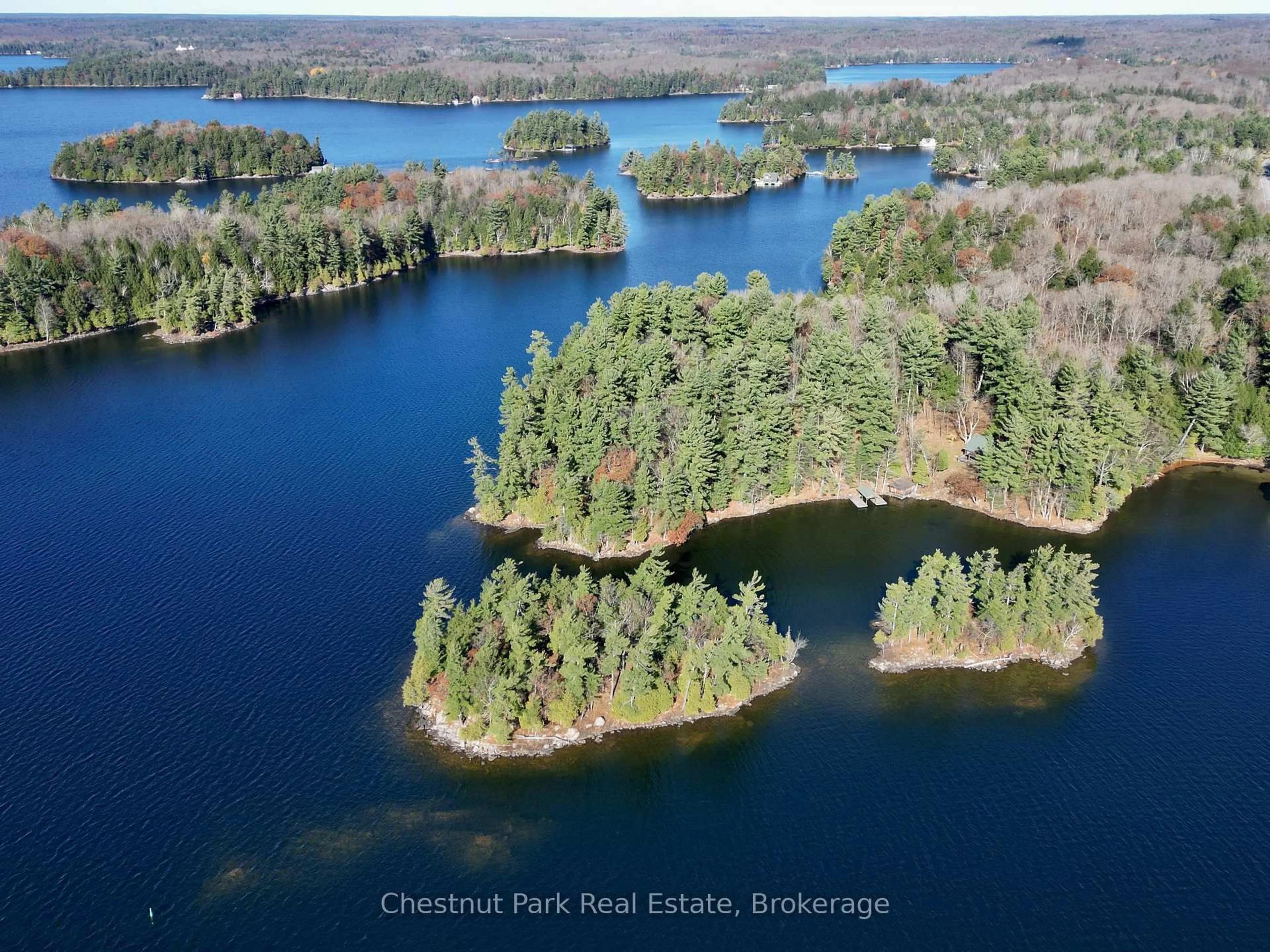 A pic from outside/outdoor area/front of a property/back of a property/a pic from drone, water/lake/river/ocean view for 1034 Old Township Rd, Muskoka Lakes Ontario P0B 1J0