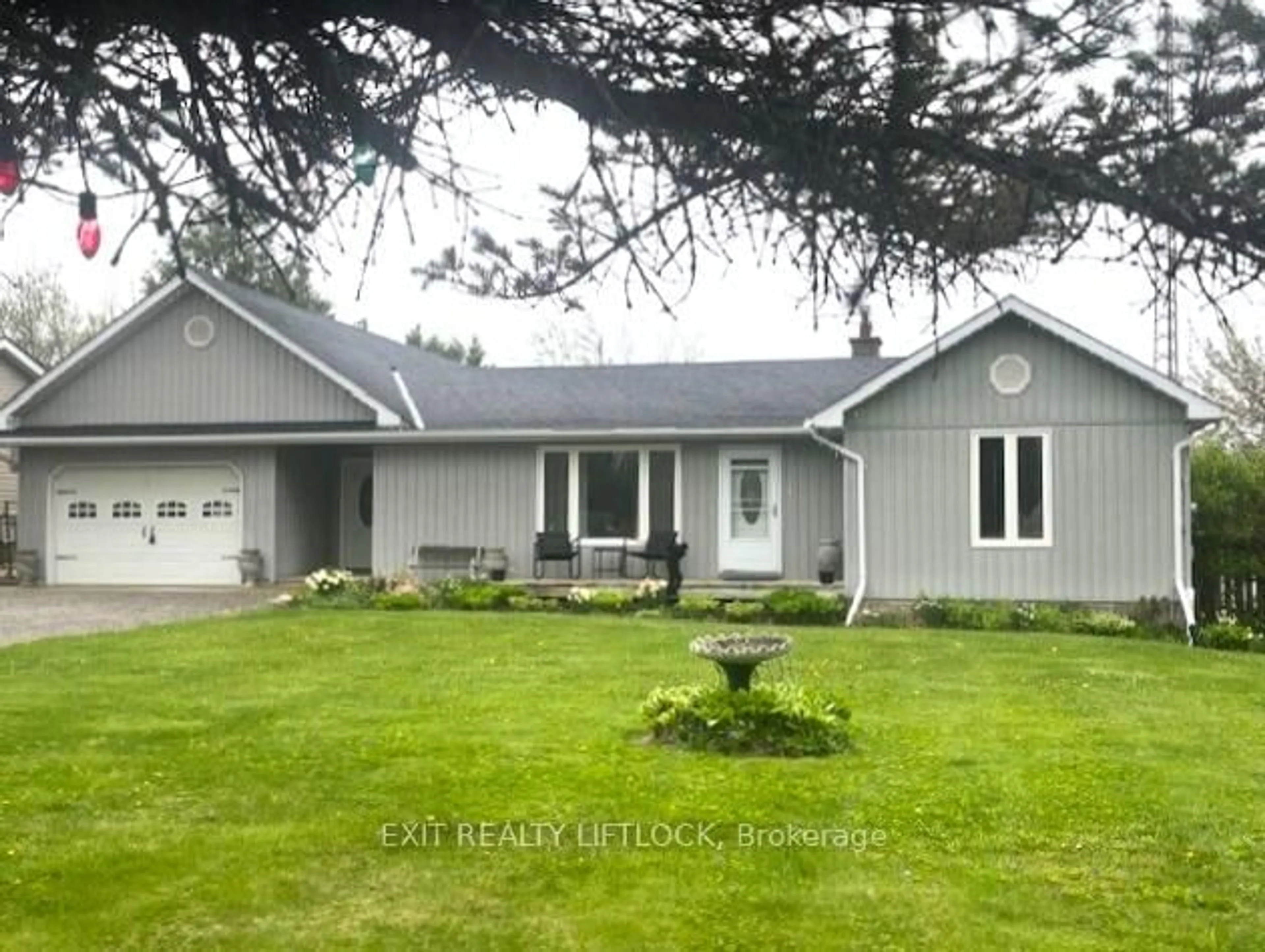 Home with vinyl exterior material, street for 890 Stewart Line, Cavan Monaghan Ontario L0A 1C0