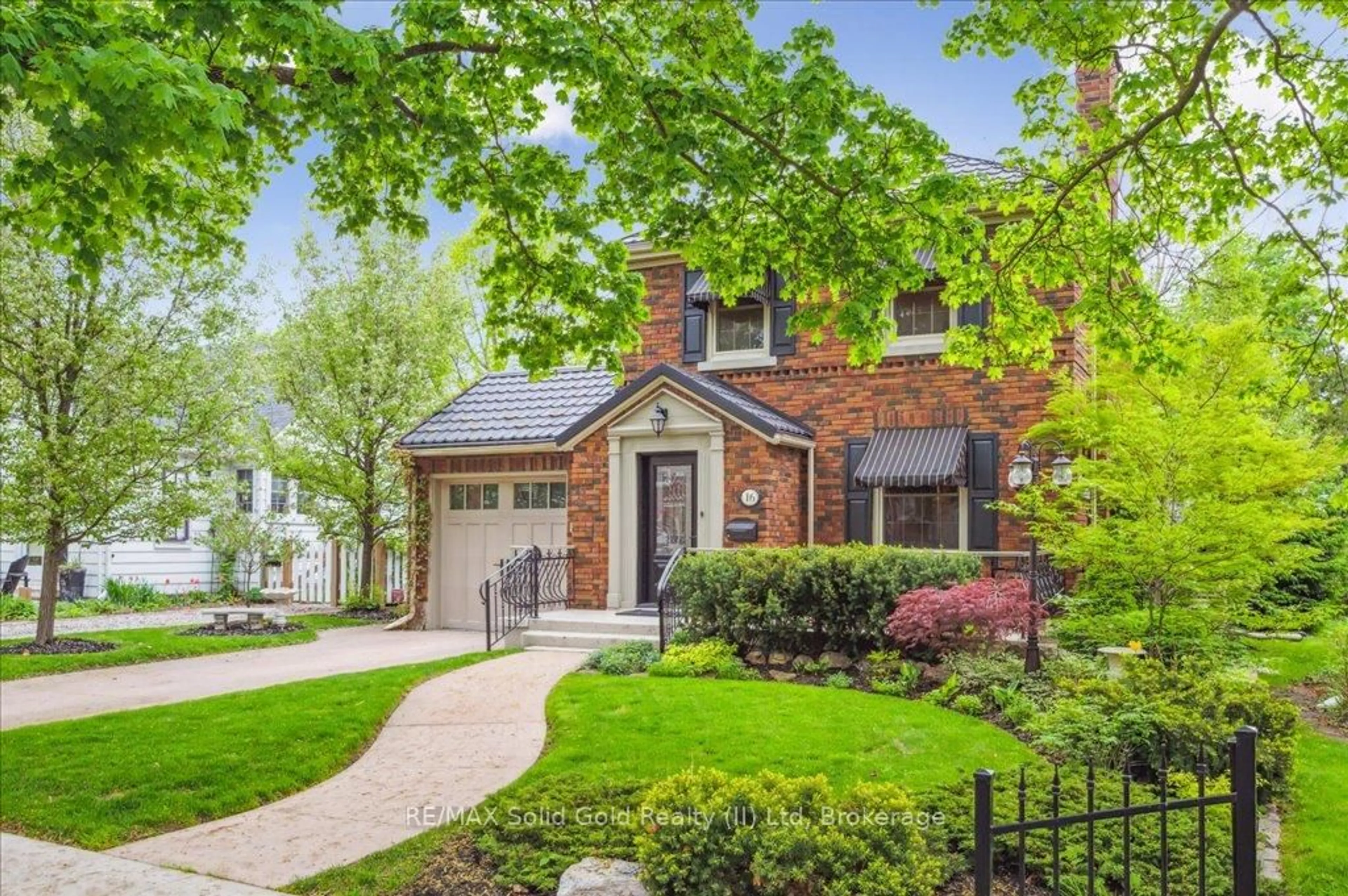 Home with brick exterior material, street for 16 Earl St, Kitchener Ontario N2M 2V4