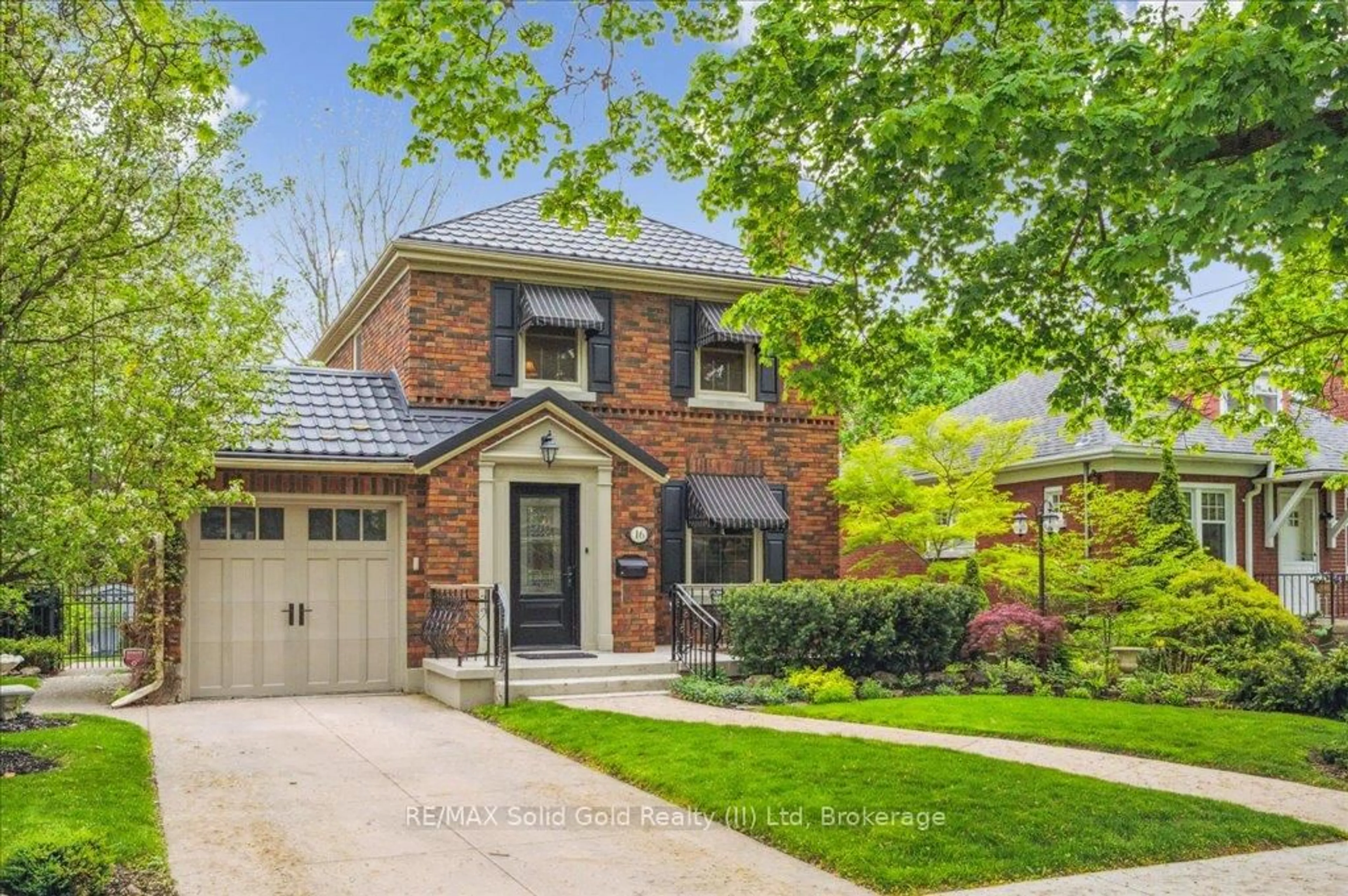 Home with brick exterior material, street for 16 Earl St, Kitchener Ontario N2M 2V4