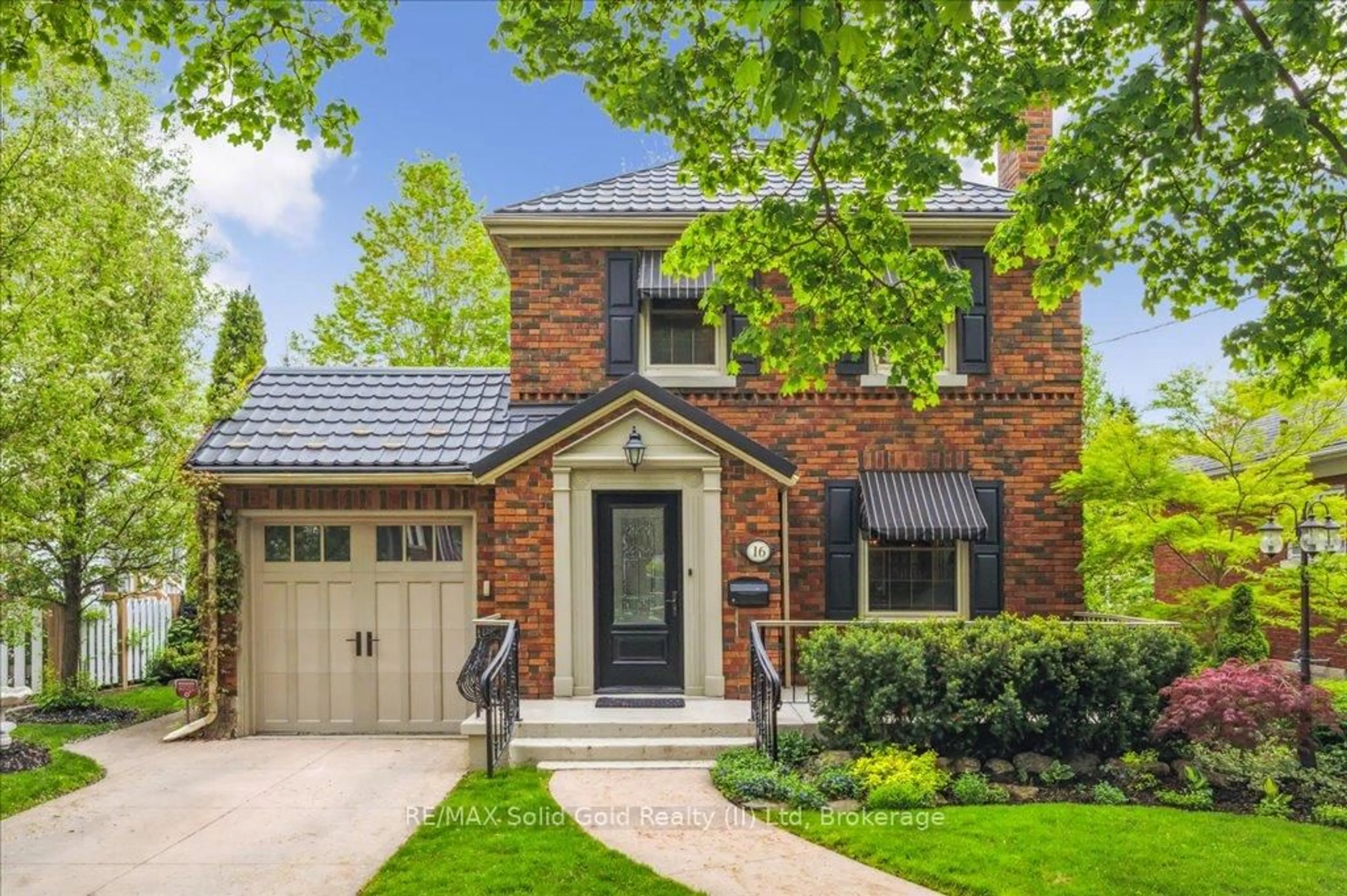 Home with brick exterior material, street for 16 Earl St, Kitchener Ontario N2M 2V4