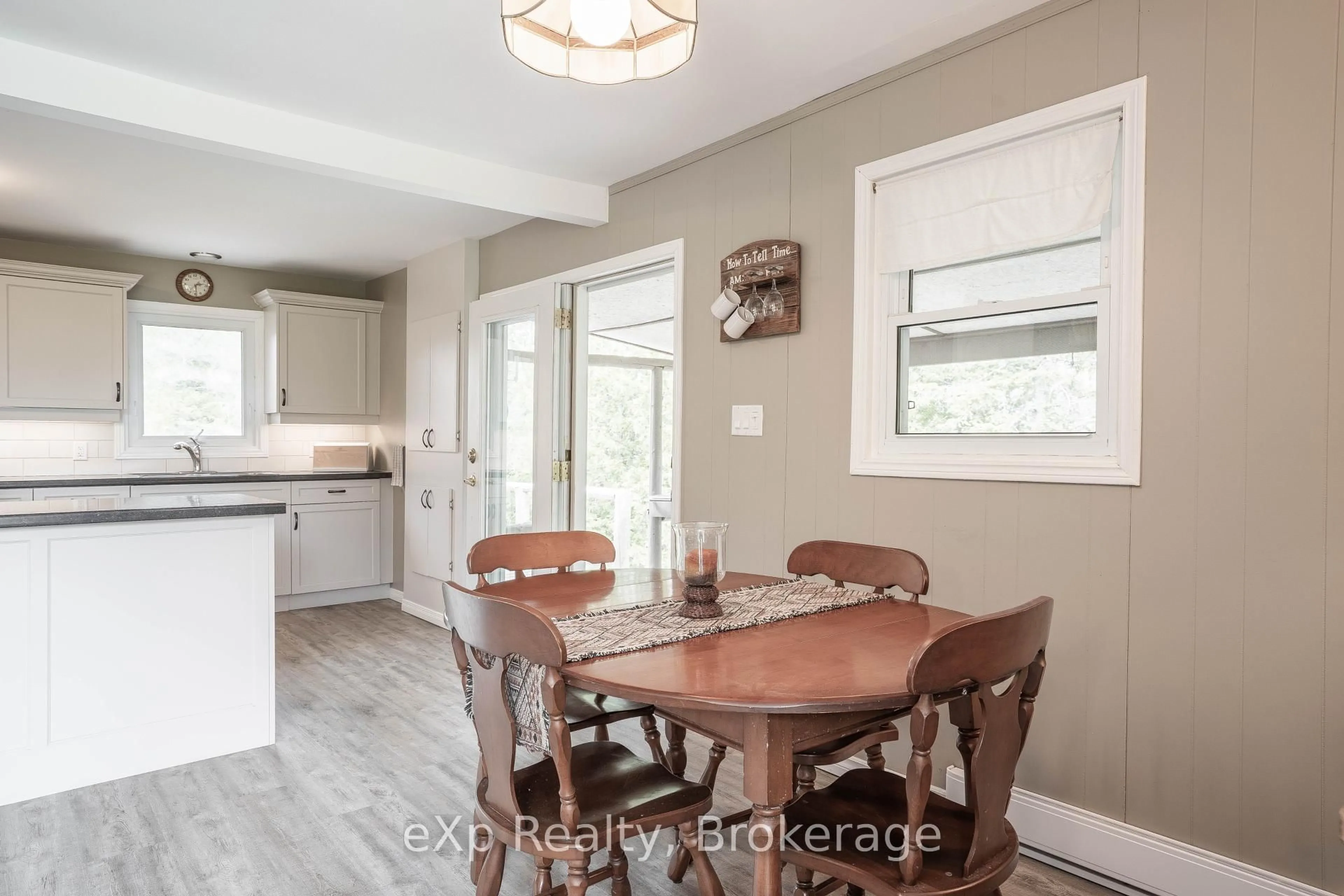 Open concept kitchen, wood/laminate floor for 248 Widgeon Cove Rd, Northern Bruce Peninsula Ontario N0H 2T0