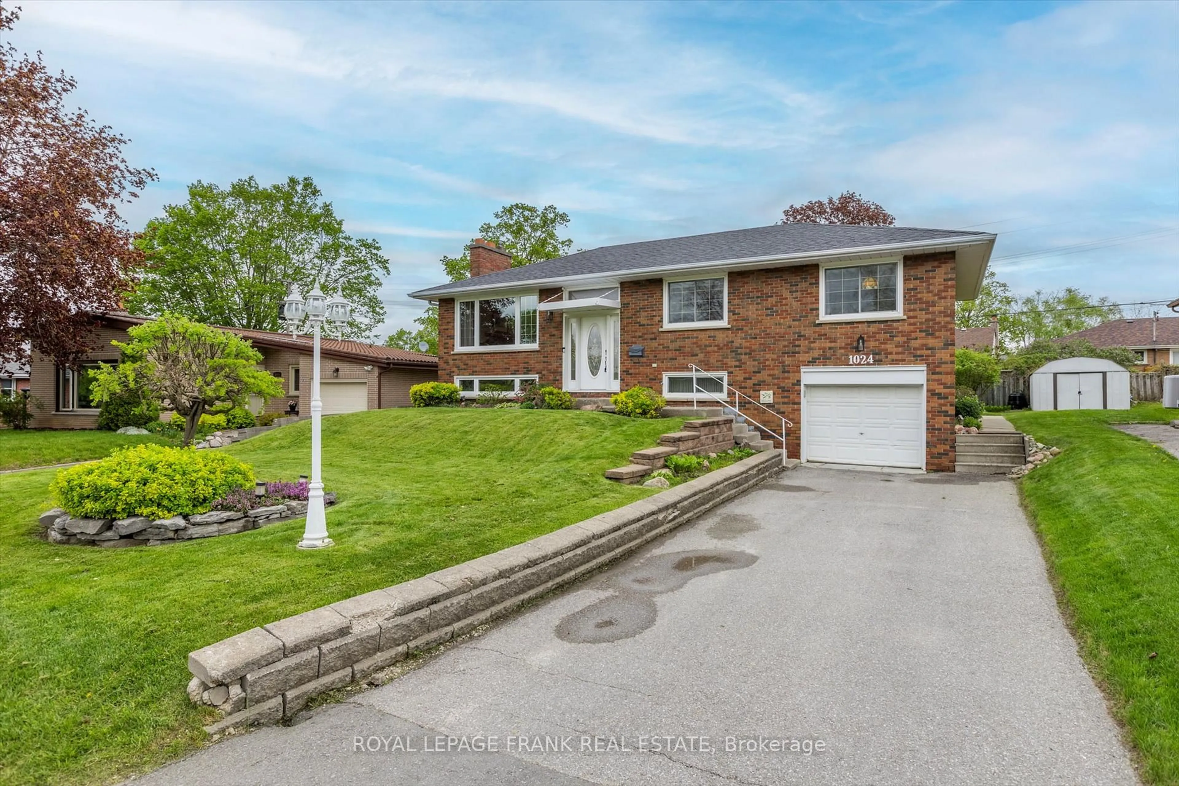 Home with brick exterior material, street for 1024 Hatfield Cres, Peterborough North Ontario K9H 6L8