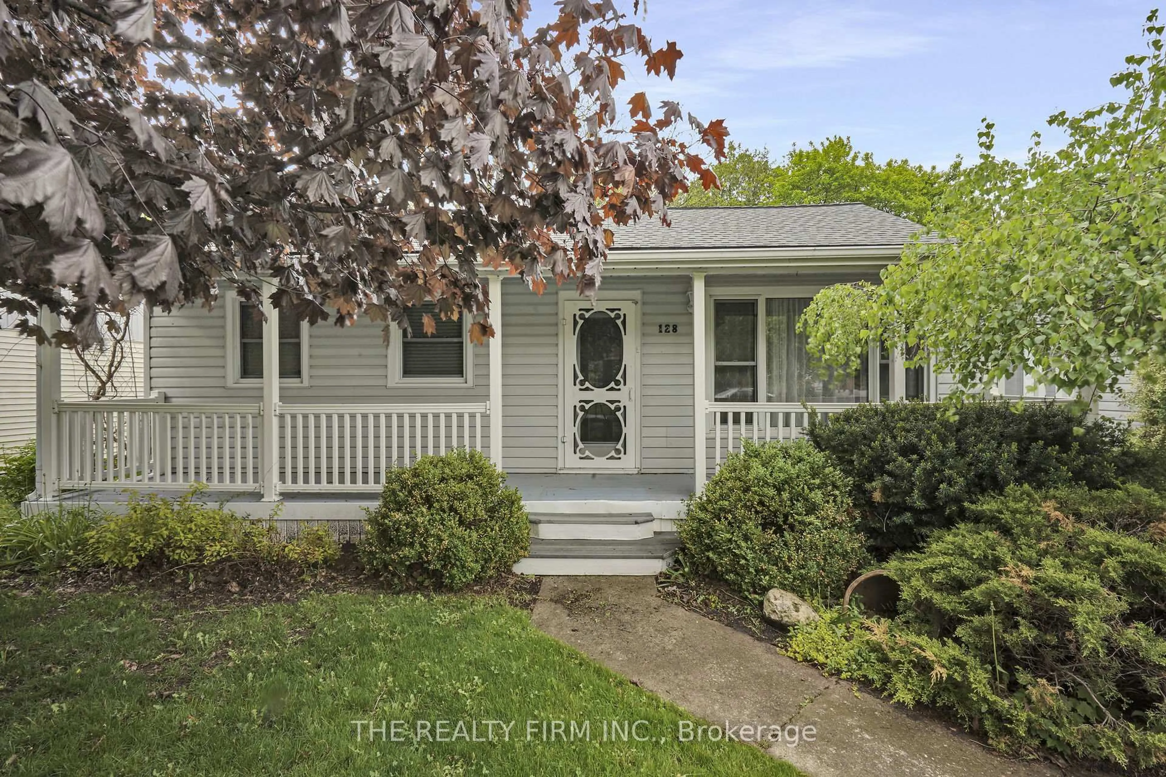 Home with vinyl exterior material, street for 128 Queen St, Thames Centre Ontario N0L 1G2