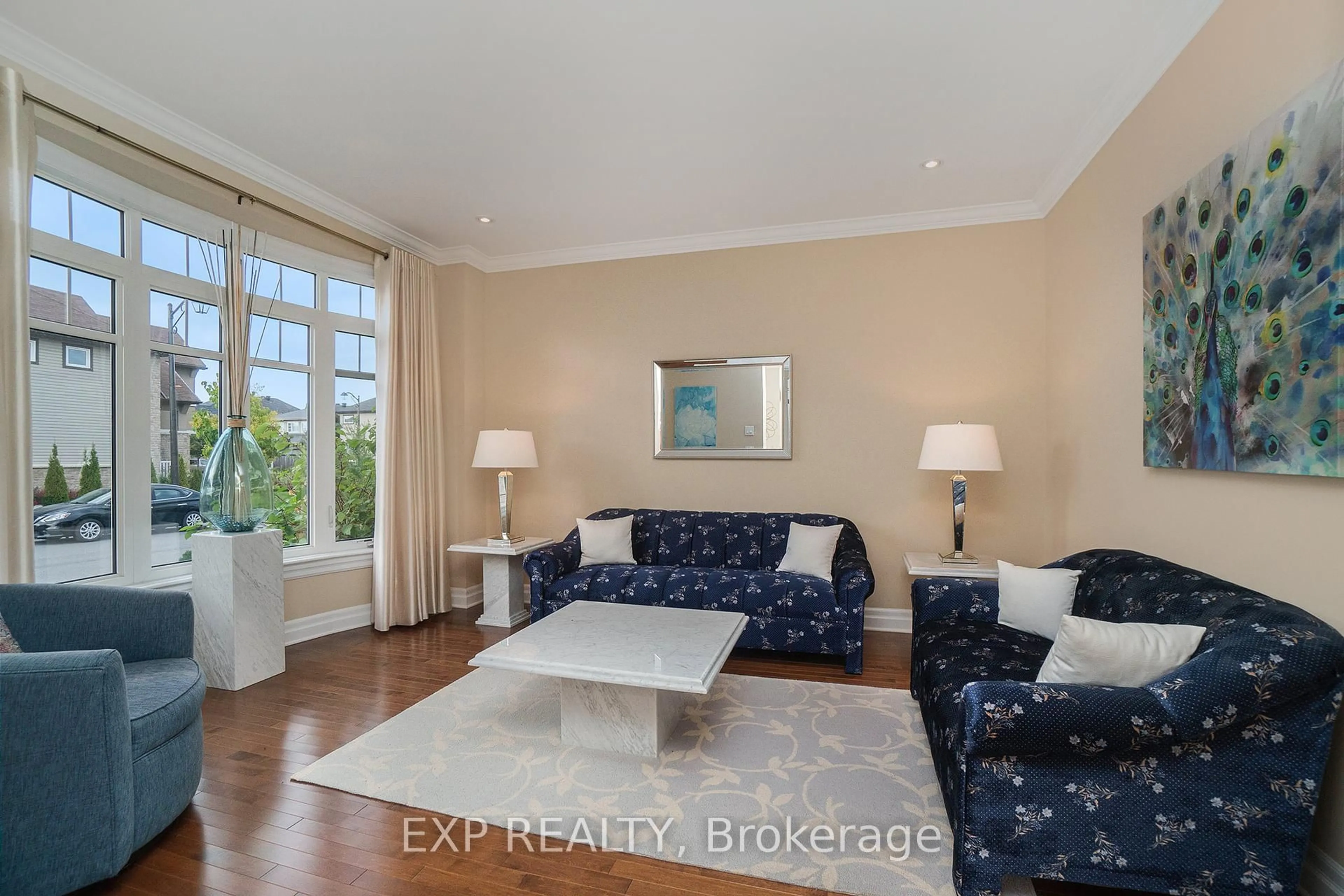 Living room with furniture, wood/laminate floor for 418 Cavesson St, Ottawa Ontario K2V 0A8