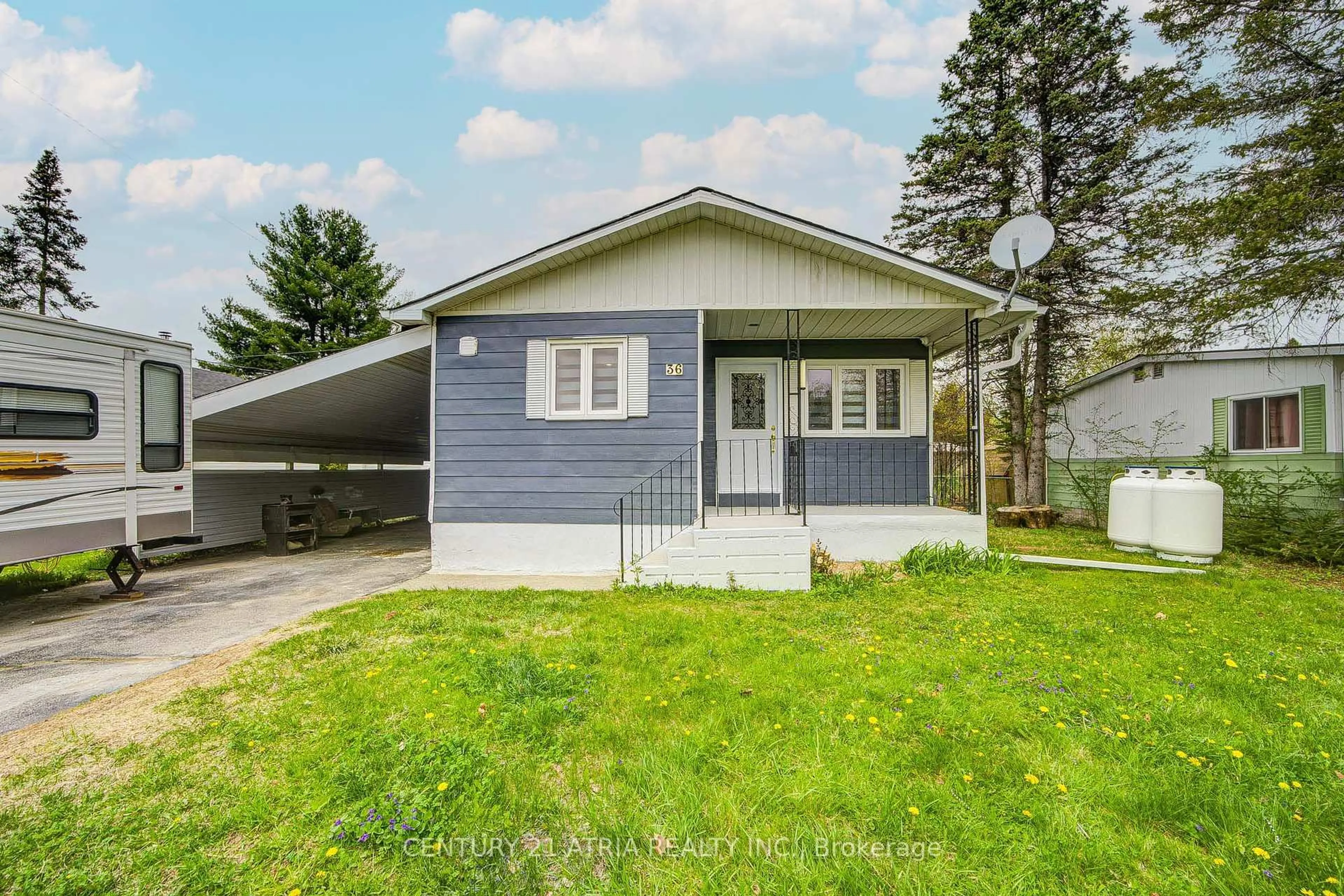 Home with vinyl exterior material, street for 36 Great Oak St, Highlands East Ontario K0L 1M0