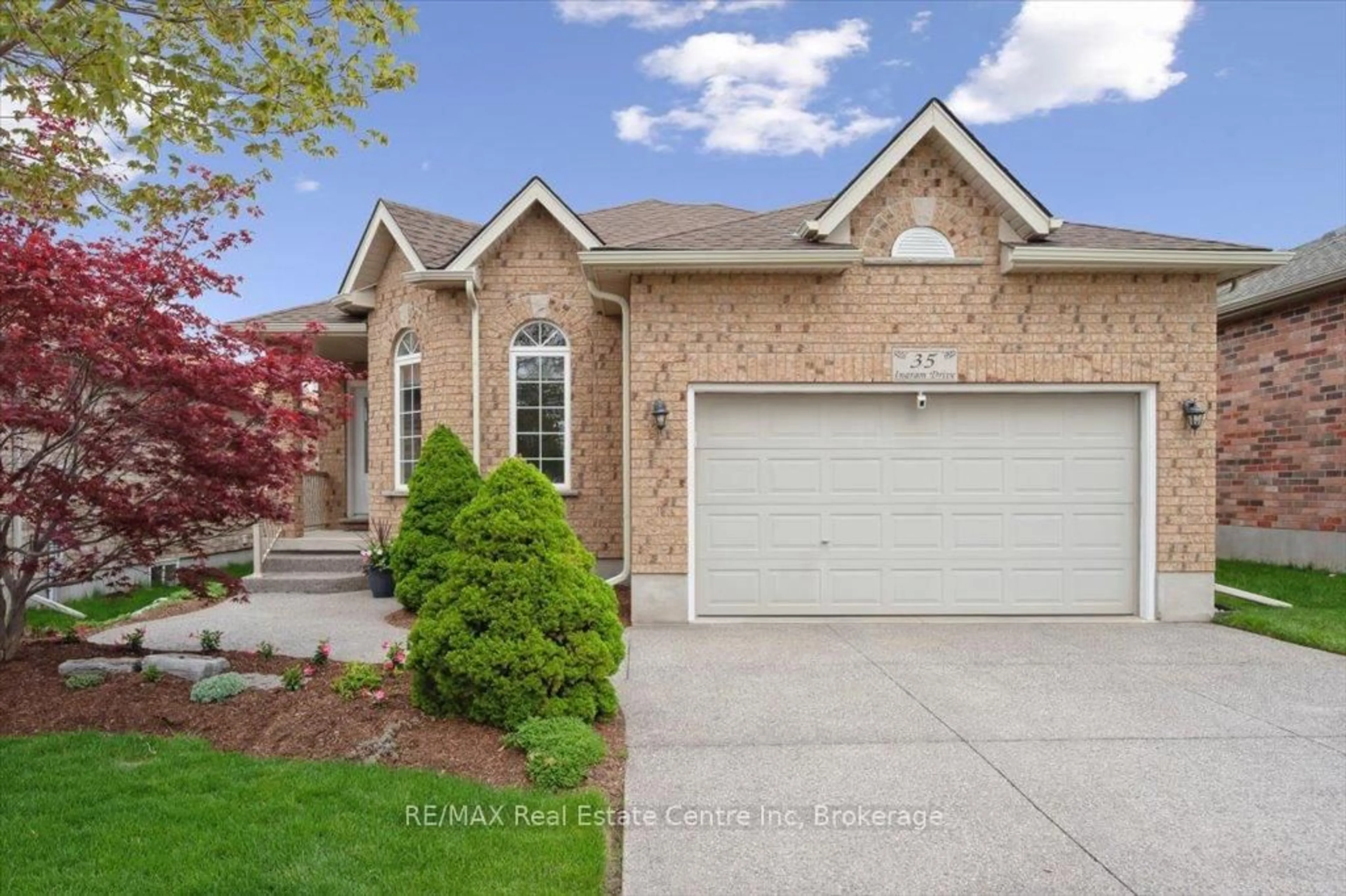Home with brick exterior material, street for 35 Ingram Dr, Guelph Ontario N1E 0B1