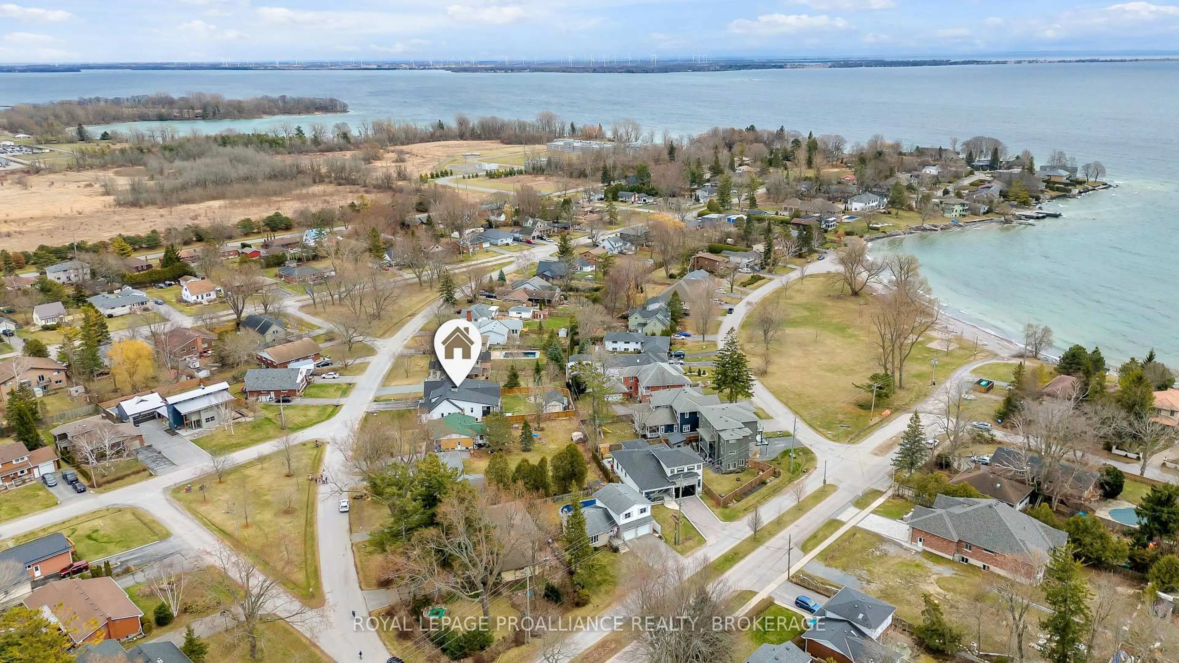 A pic from outside/outdoor area/front of a property/back of a property/a pic from drone, water/lake/river/ocean view for 7 Crescent Dr, Kingston Ontario K7M 4J3
