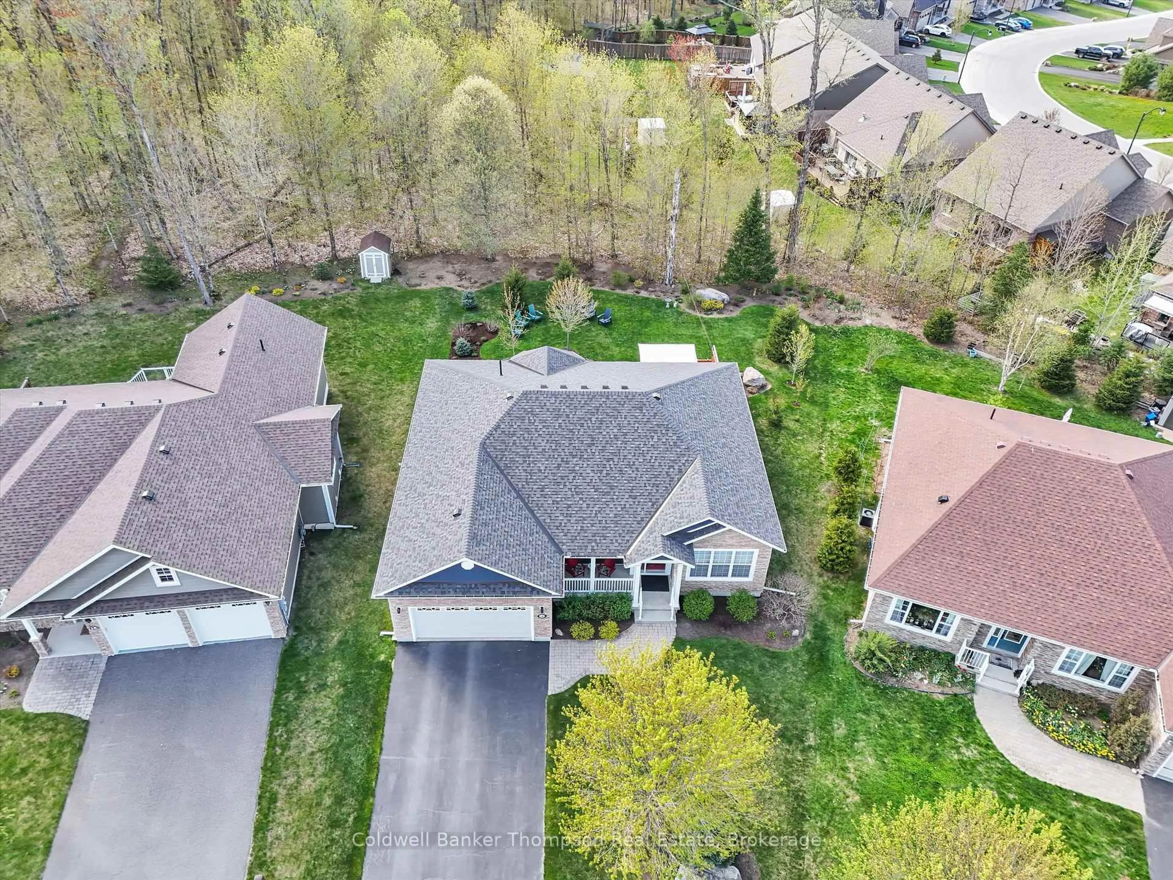 A pic from outside/outdoor area/front of a property/back of a property/a pic from drone, street for 16 Homestead Lane, Huntsville Ontario P1H 2N8