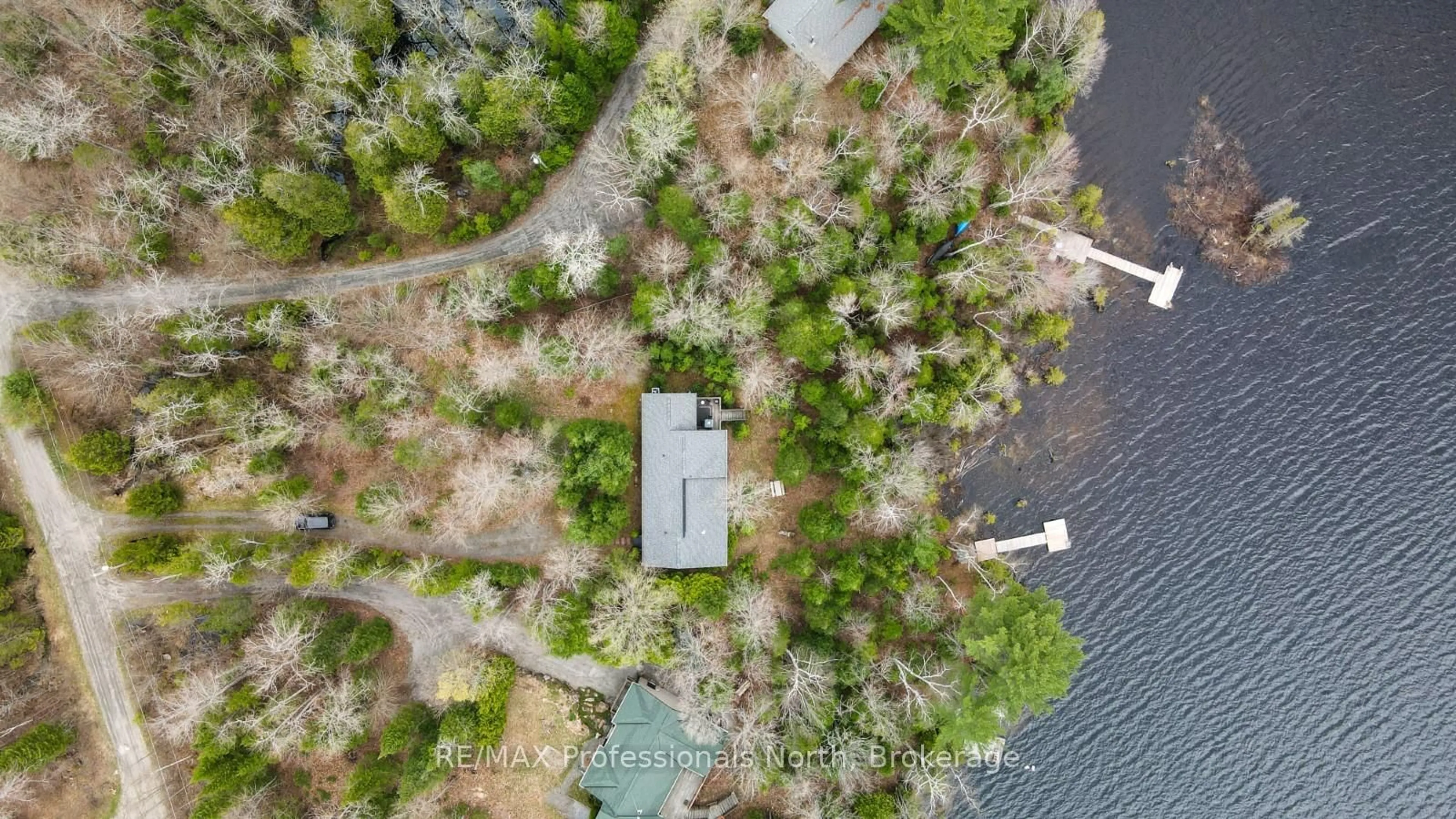 A pic from outside/outdoor area/front of a property/back of a property/a pic from drone, water/lake/river/ocean view for 1073 Driftwood Bay Dr, Highlands East Ontario K0L 2Y0