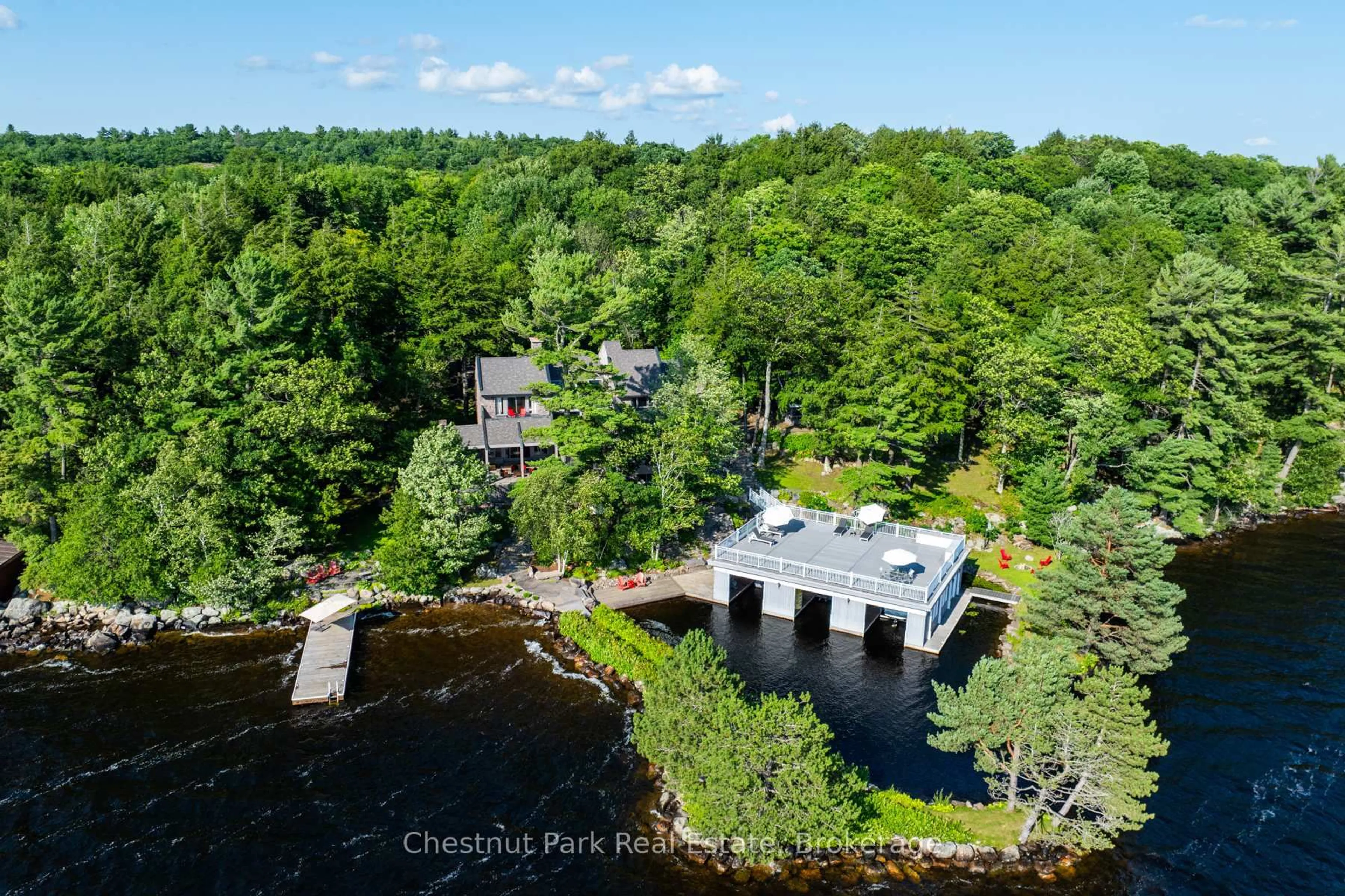 A pic from outside/outdoor area/front of a property/back of a property/a pic from drone, water/lake/river/ocean view for 2045 Muskoka Rd 118 Rd #10, Muskoka Lakes Ontario P1L 1W8