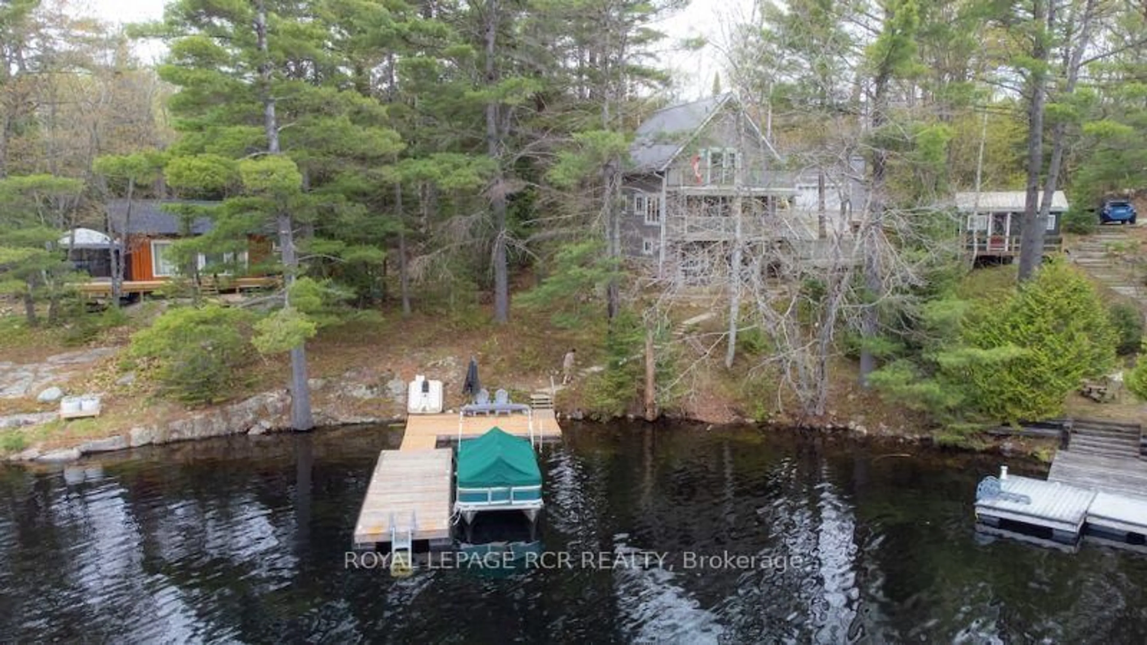 A pic from outside/outdoor area/front of a property/back of a property/a pic from drone, water/lake/river/ocean view for 1072 Apple Dr, Highlands East Ontario K0M 1R0