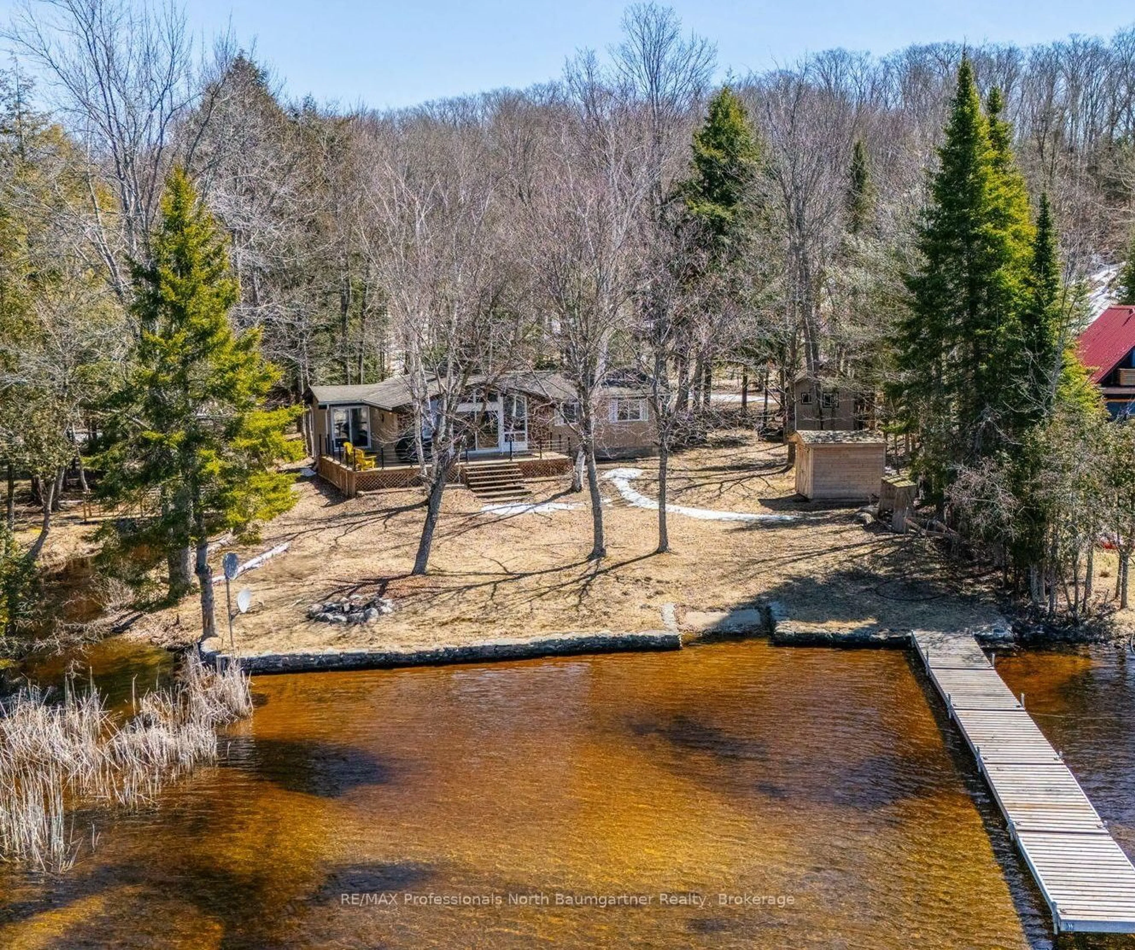 A pic from outside/outdoor area/front of a property/back of a property/a pic from drone, water/lake/river/ocean view for 1088 Gravel Pit Dr, Minden Hills Ontario K0M 2K0