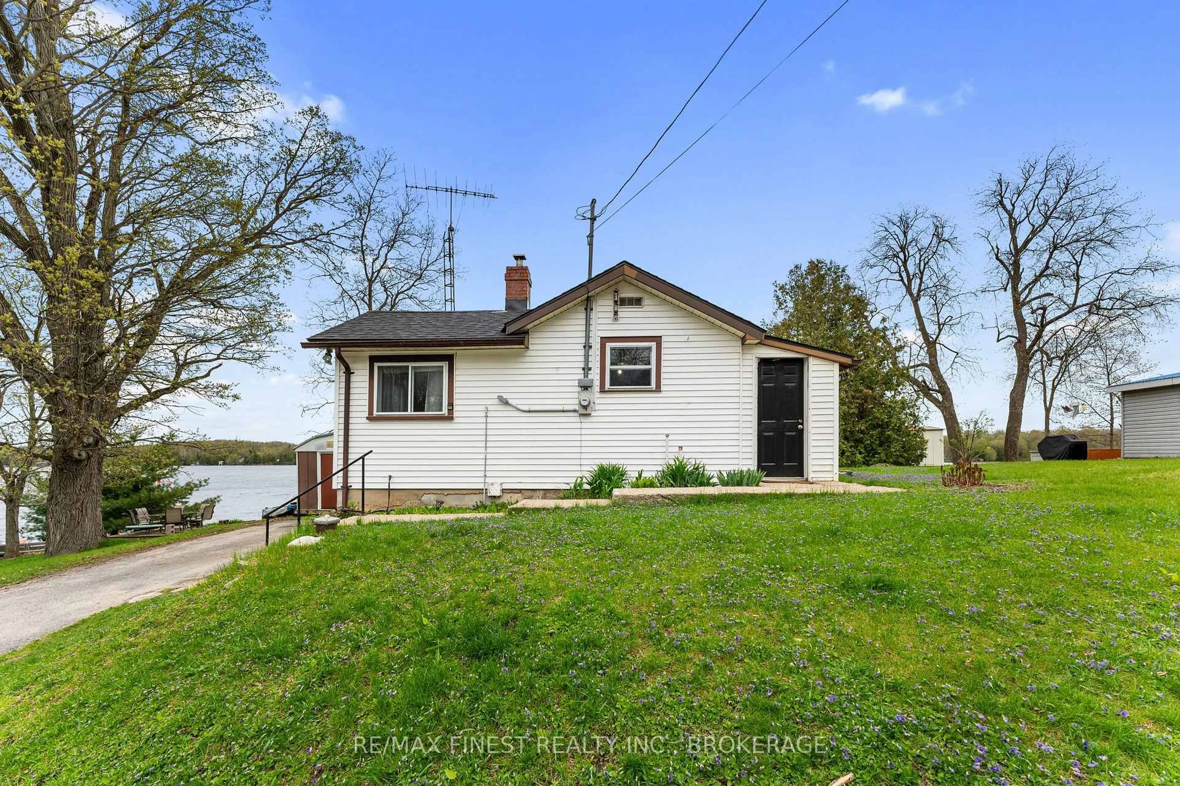 A pic from outside/outdoor area/front of a property/back of a property/a pic from drone, water/lake/river/ocean view for 1022 Masonville Rd, Verona Ontario K0H 2W0