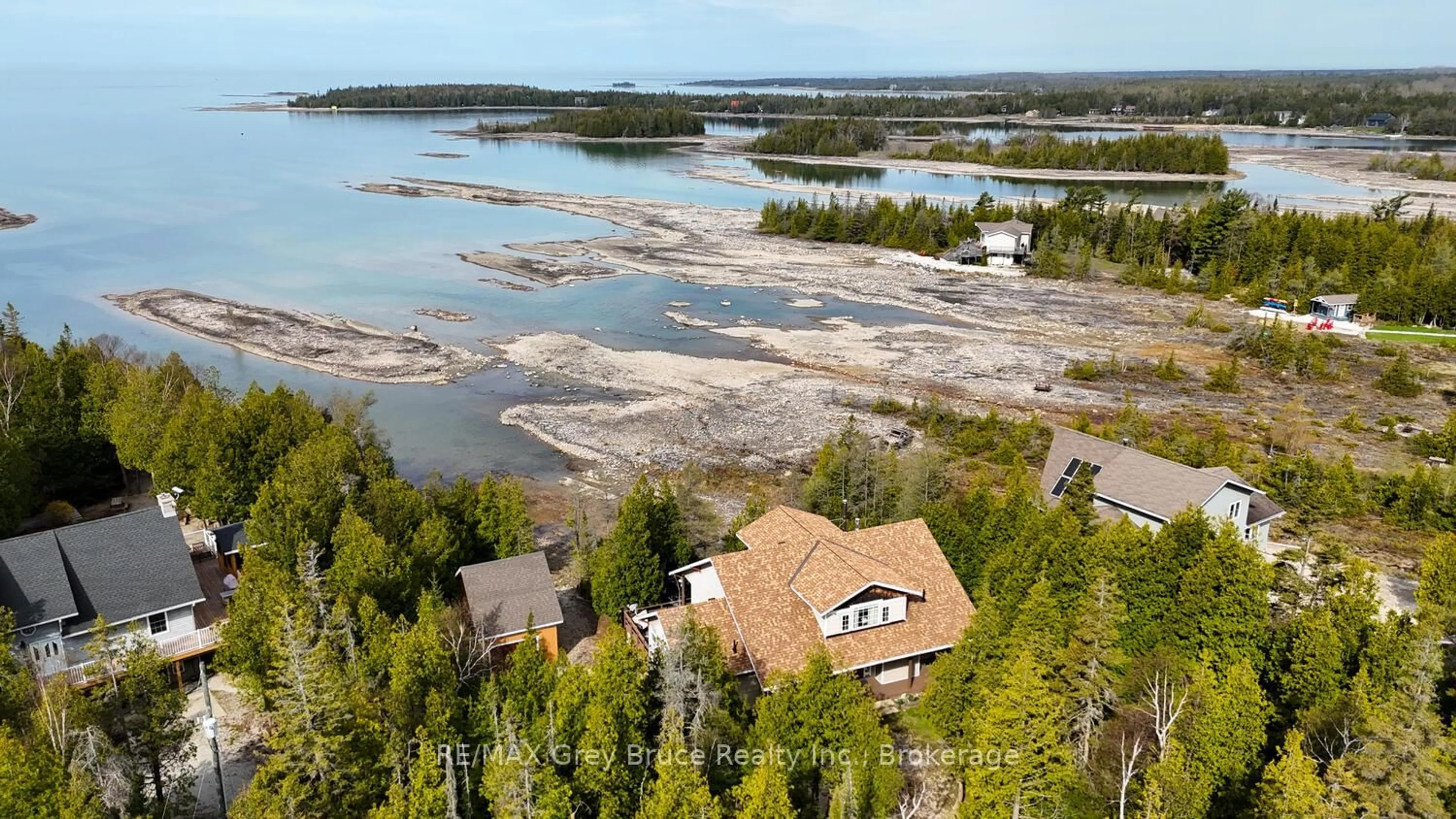 A pic from outside/outdoor area/front of a property/back of a property/a pic from drone, water/lake/river/ocean view for 205 Eagle Rd, Northern Bruce Peninsula Ontario N0H 2R0