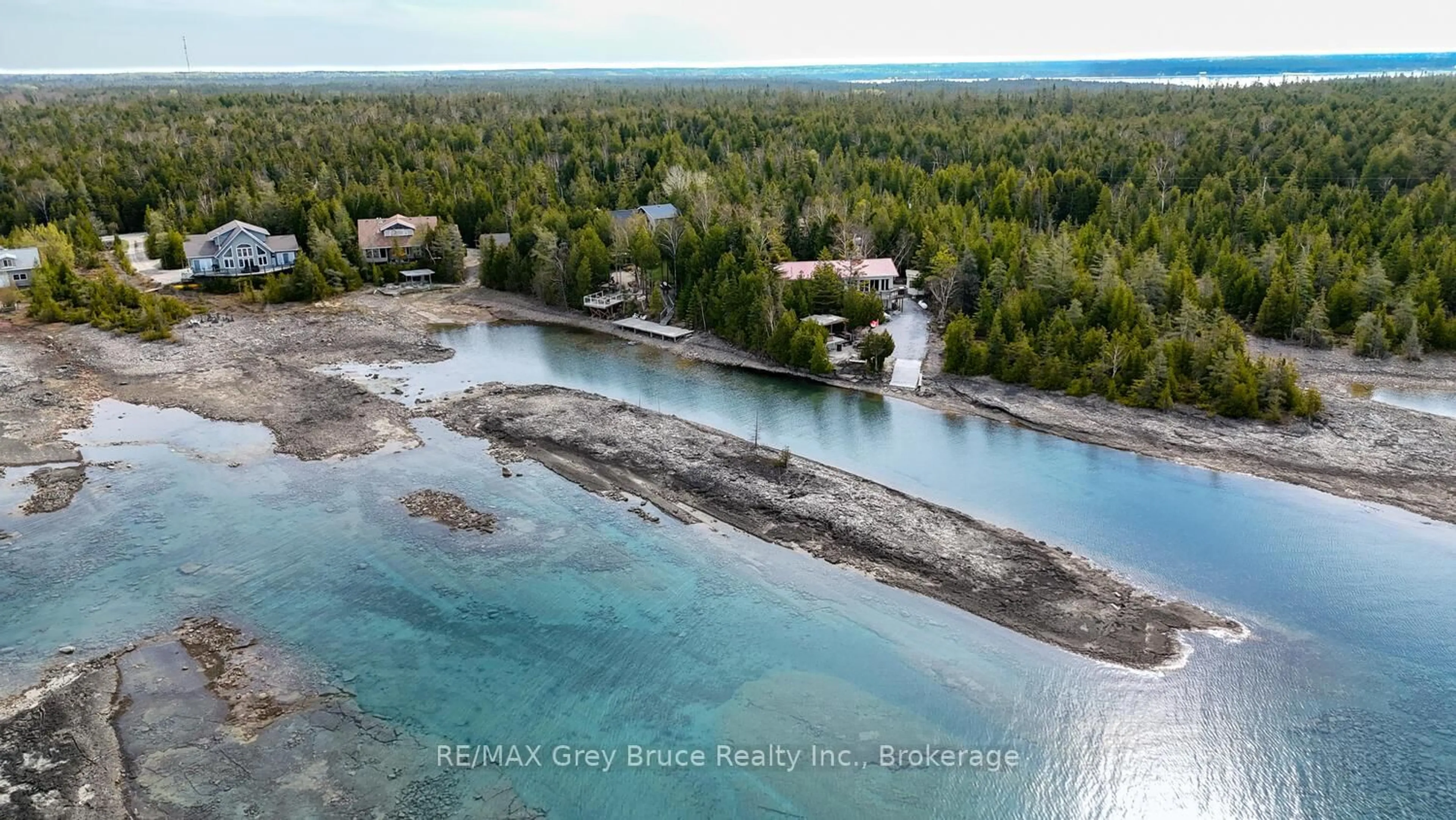 A pic from outside/outdoor area/front of a property/back of a property/a pic from drone, water/lake/river/ocean view for 205 Eagle Rd, Northern Bruce Peninsula Ontario N0H 2R0