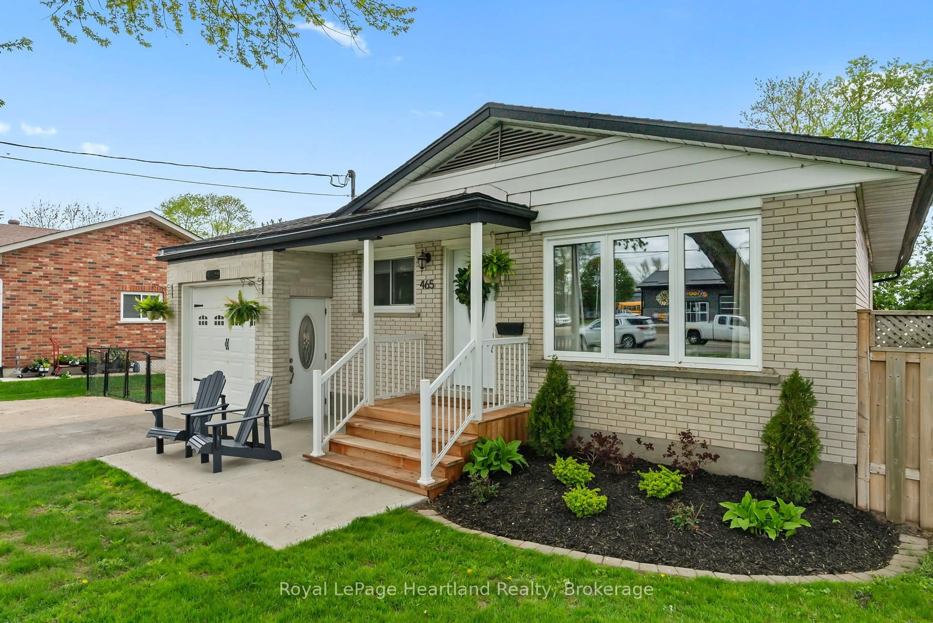 Home with vinyl exterior material, street for 465 Main St, Minto Ontario N0G 2P0