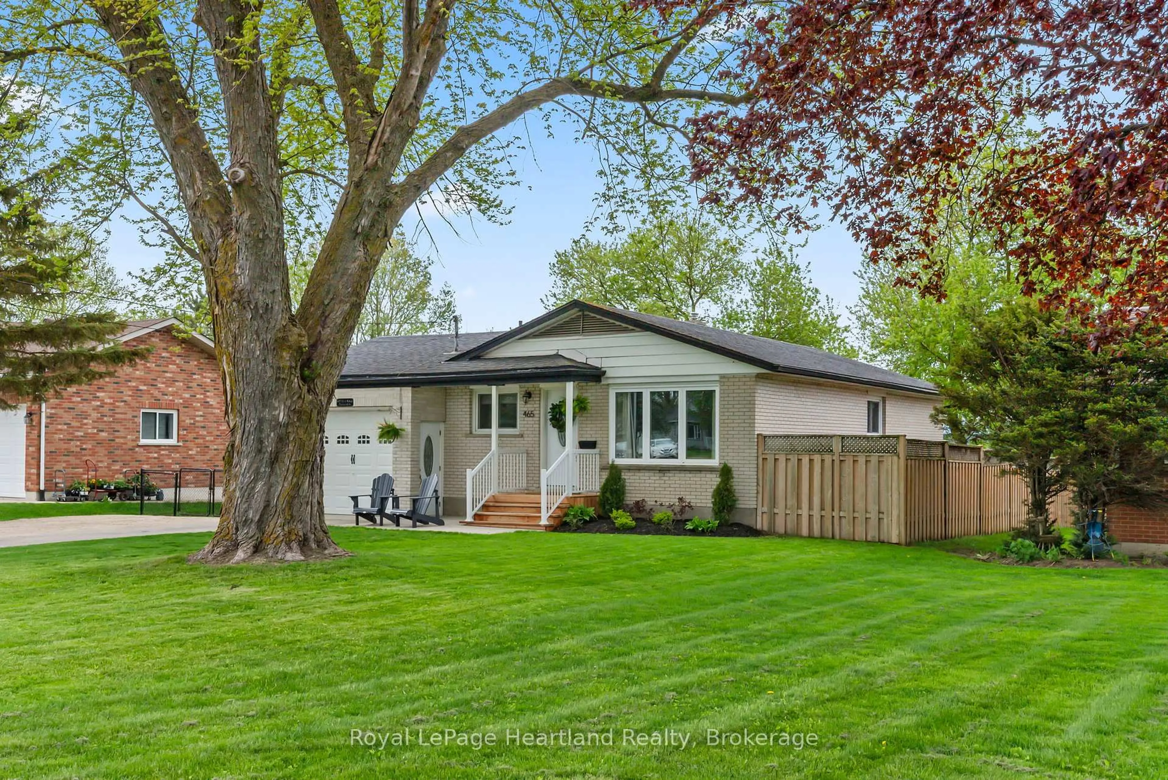 Home with vinyl exterior material, street for 465 Main St, Minto Ontario N0G 2P0