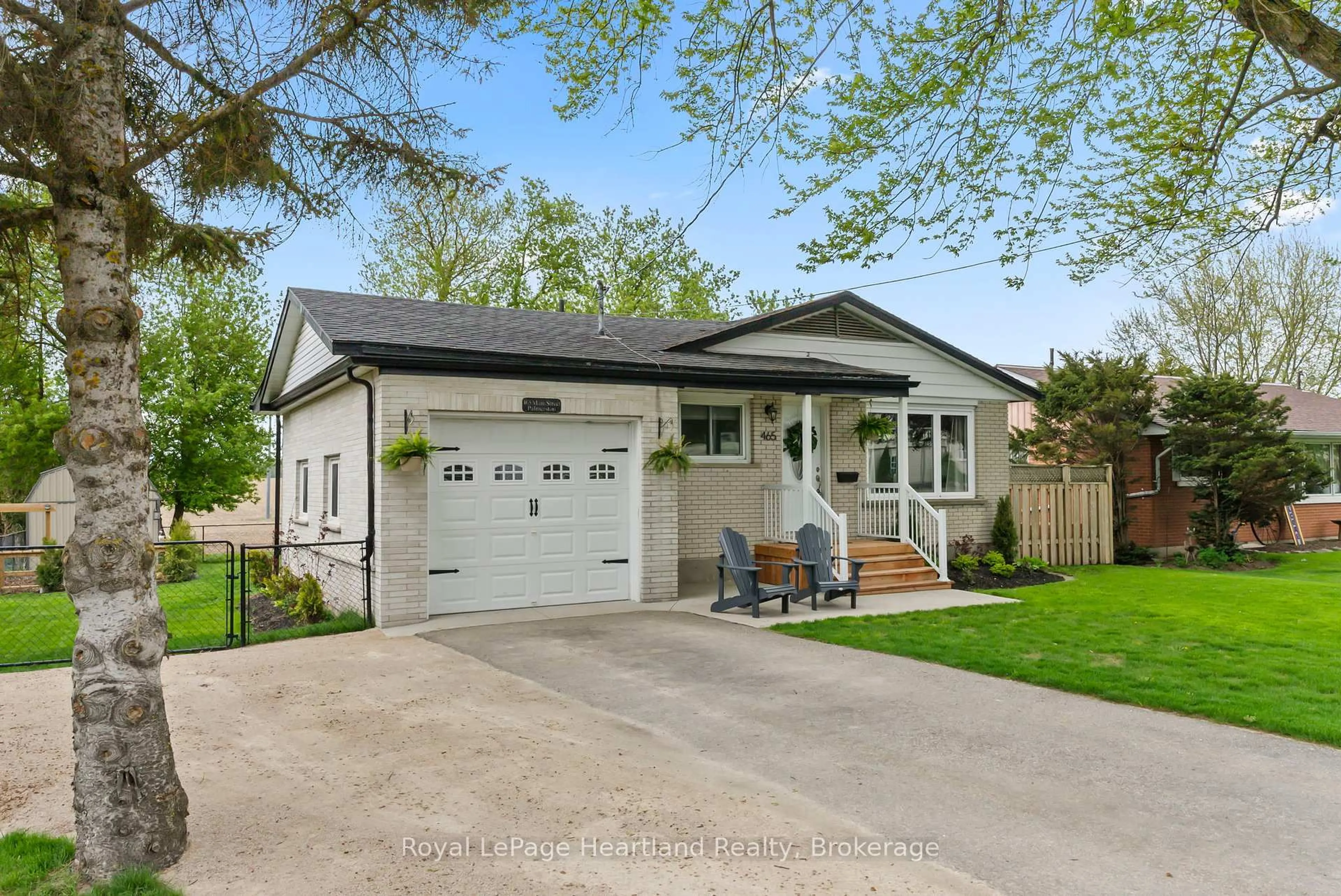 Home with vinyl exterior material, street for 465 Main St, Minto Ontario N0G 2P0