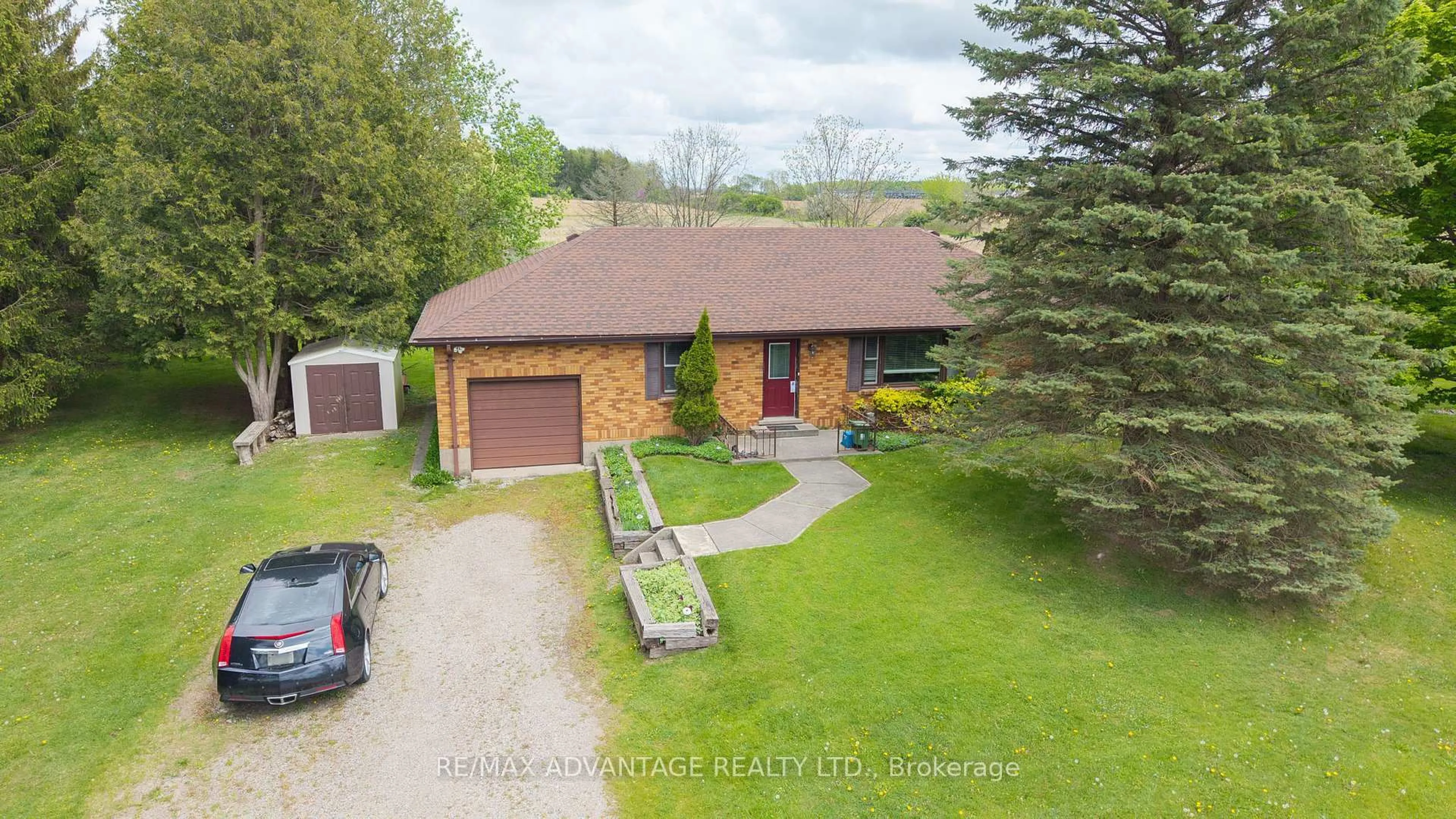 A pic from outside/outdoor area/front of a property/back of a property/a pic from drone, street for 3544 Colonel Talbot Rd, London South Ontario N6P 1H5