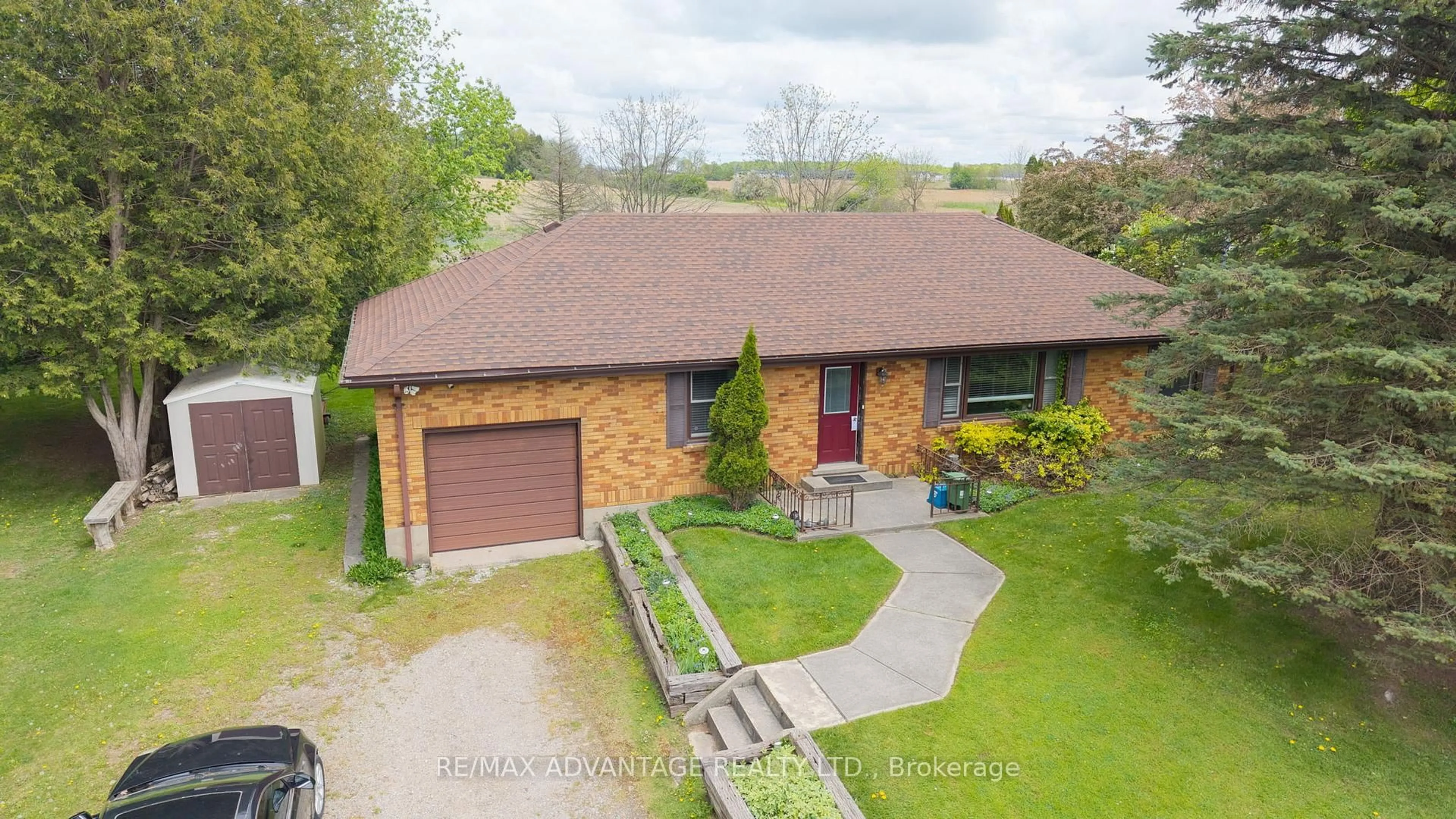 A pic from outside/outdoor area/front of a property/back of a property/a pic from drone, street for 3544 Colonel Talbot Rd, London South Ontario N6P 1H5